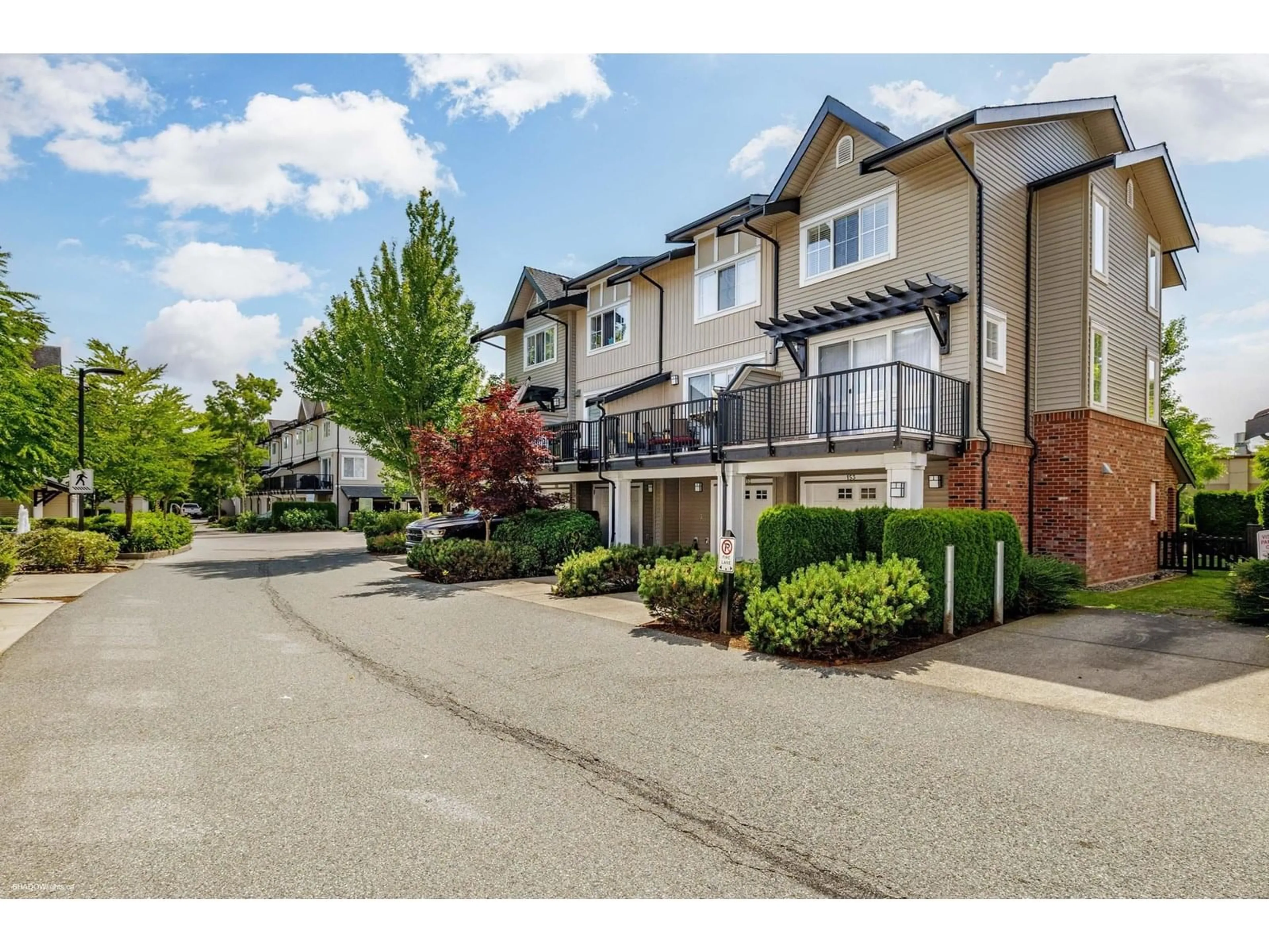 A pic from outside/outdoor area/front of a property/back of a property/a pic from drone, street for 153 - 2450 161A, Surrey British Columbia V3Z8K4