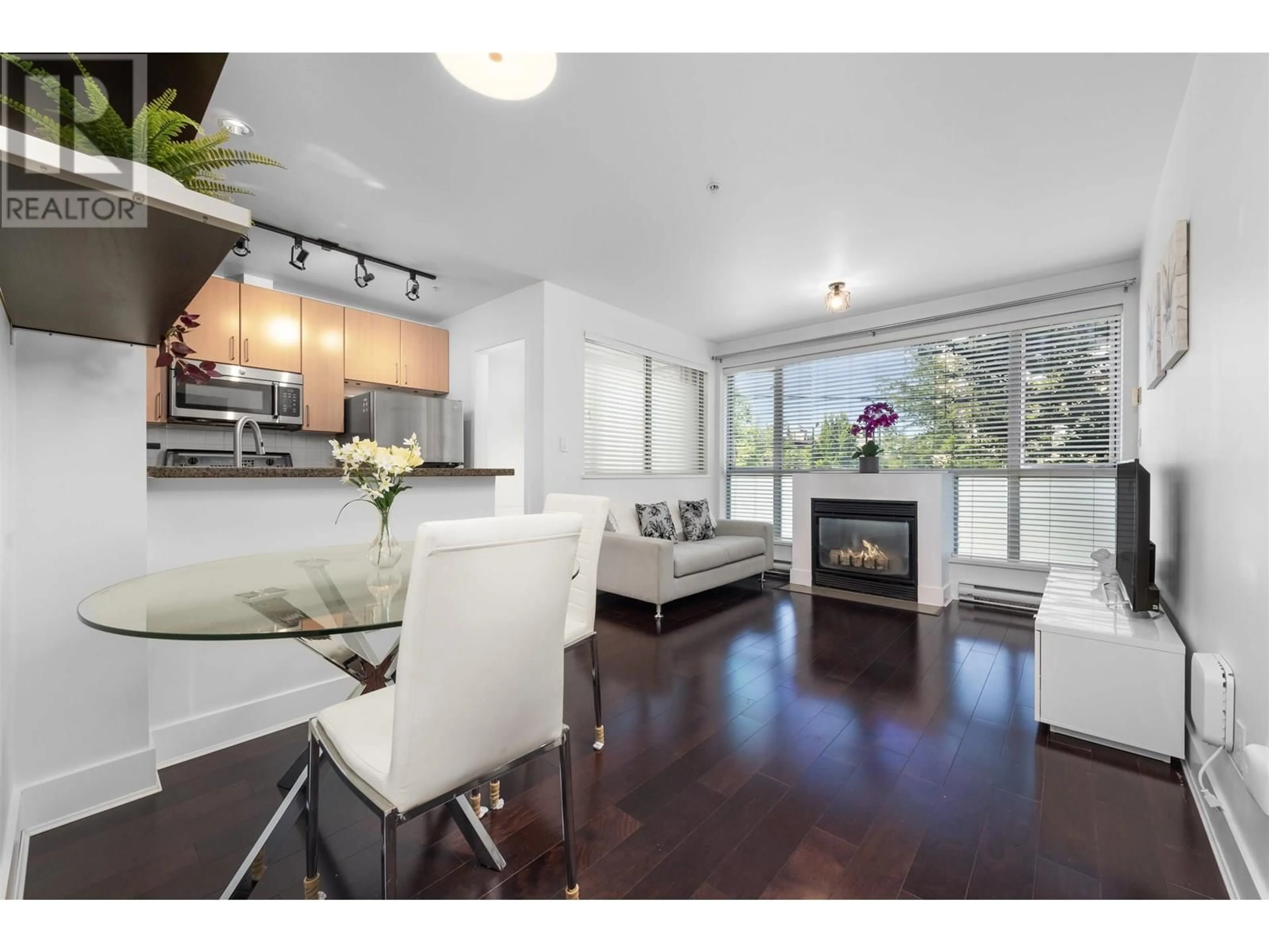 Open concept kitchen, wood/laminate floor for 204 - 2680 ARBUTUS STREET, Vancouver British Columbia V6J5L8