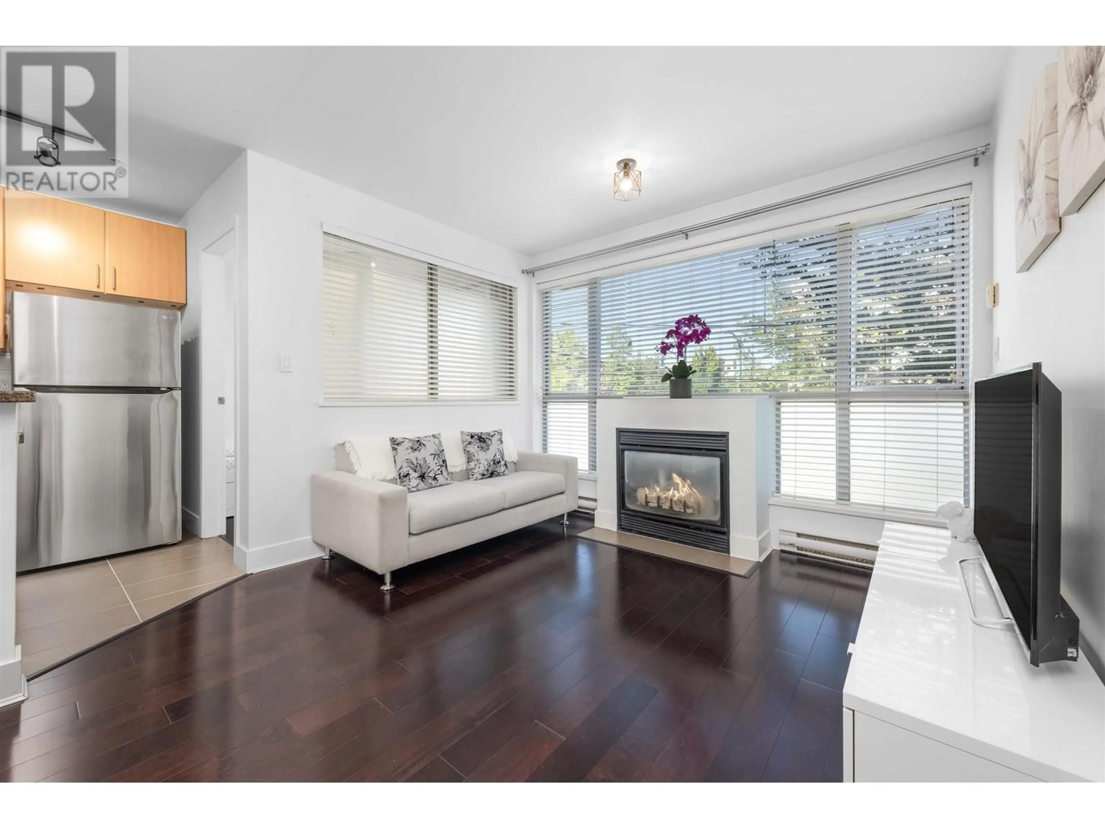 Living room with furniture, wood/laminate floor for 204 - 2680 ARBUTUS STREET, Vancouver British Columbia V6J5L8