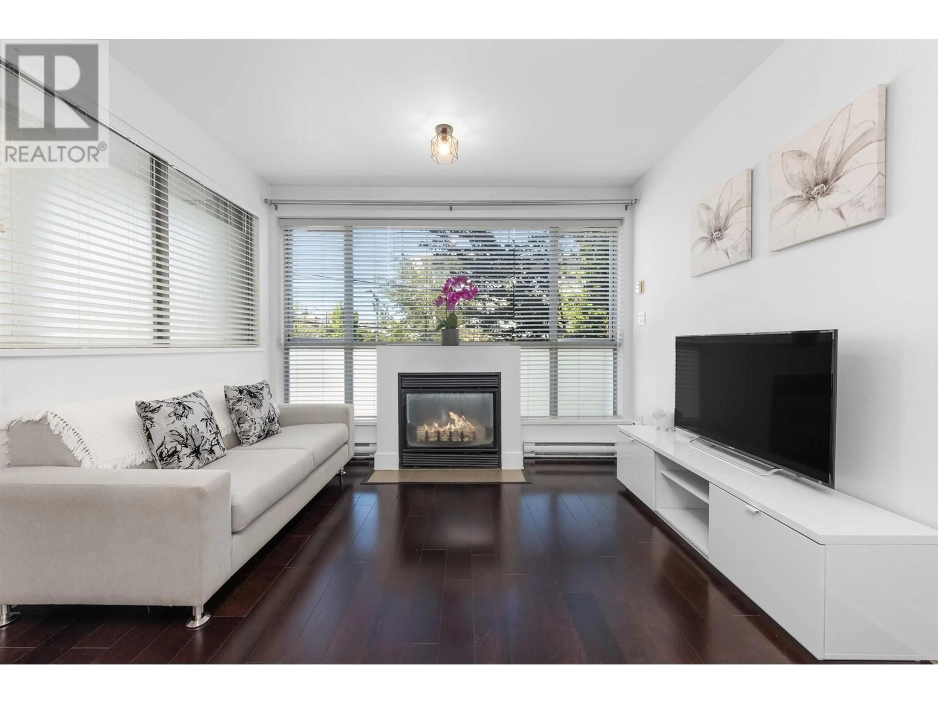 Living room with furniture, wood/laminate floor for 204 - 2680 ARBUTUS STREET, Vancouver British Columbia V6J5L8
