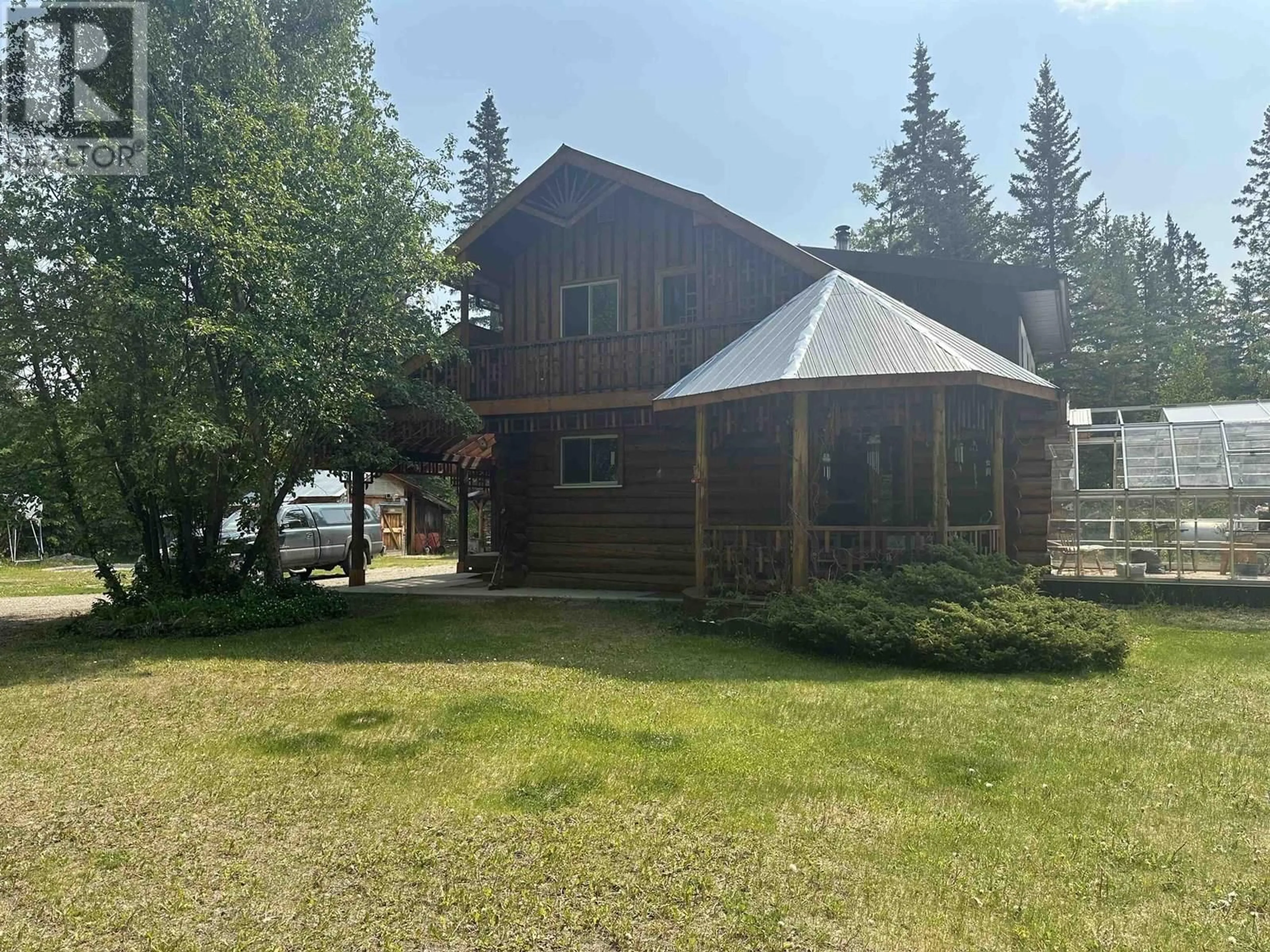 A pic from outside/outdoor area/front of a property/back of a property/a pic from drone, mountain view for 21023 TOMPKINS ROAD, Hudsons Hope British Columbia V0C1V0