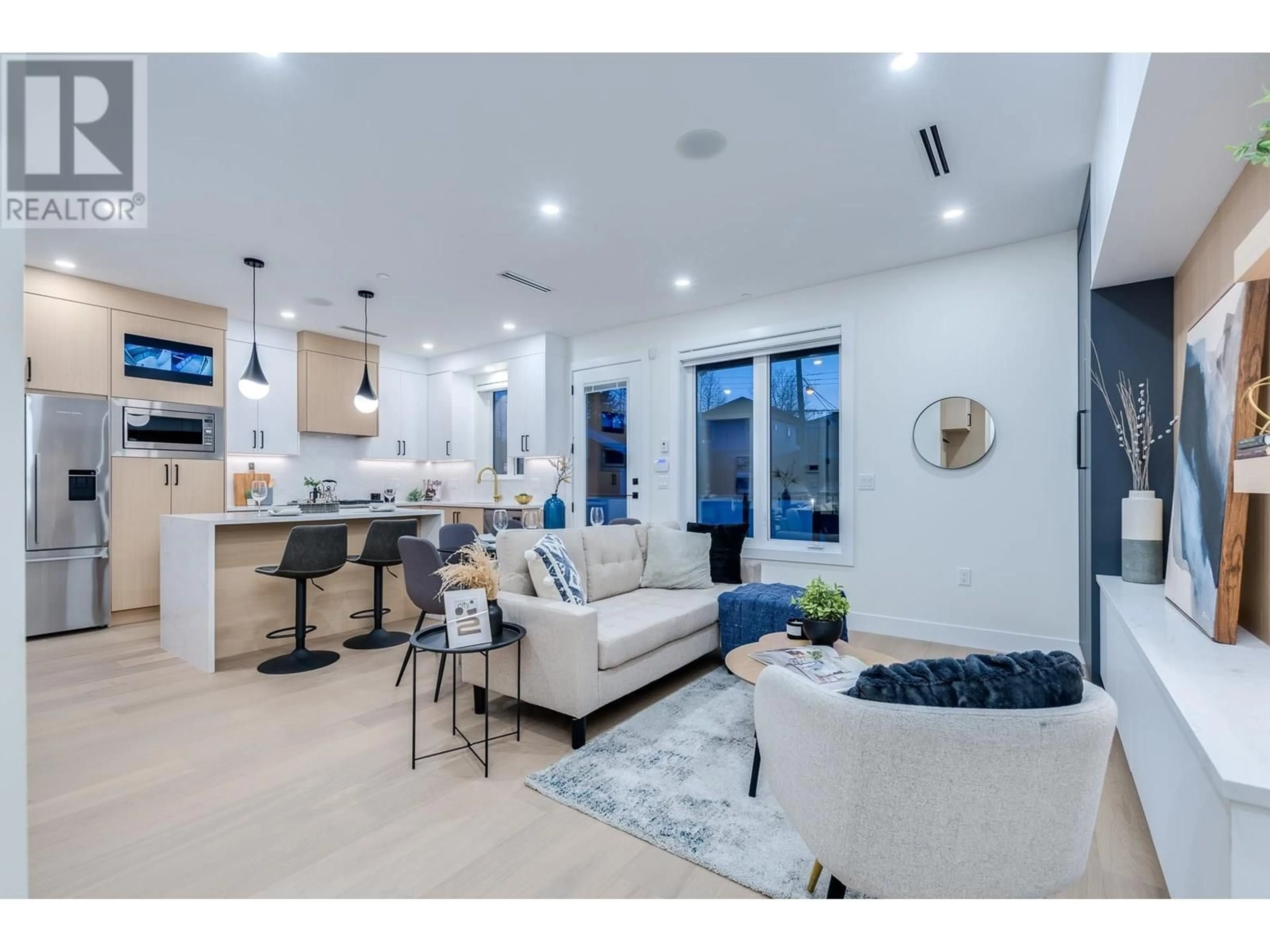 Open concept kitchen, ceramic/tile floor for 1 - 5459 RHODES STREET, Vancouver British Columbia V5R3P1