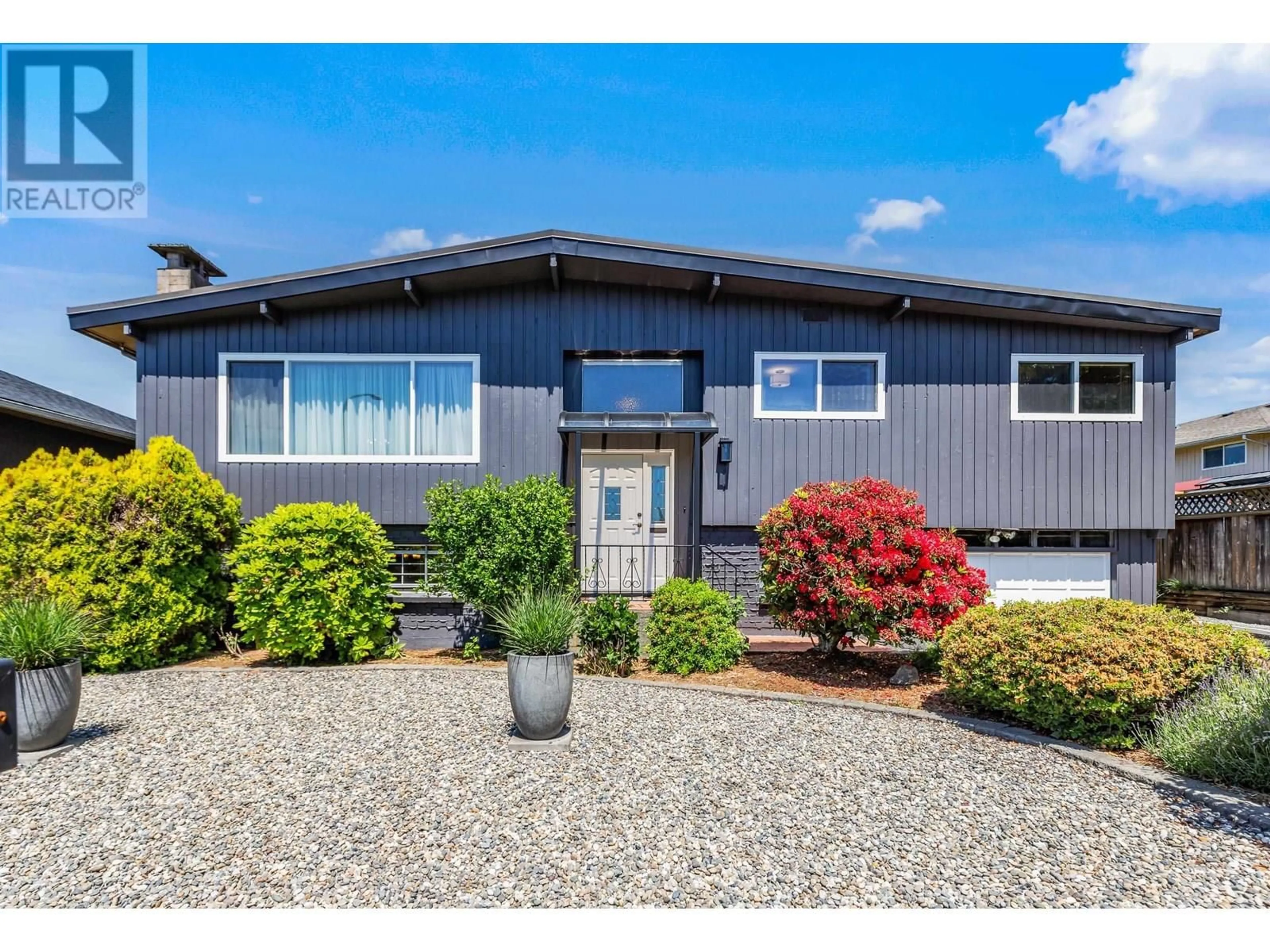 Home with vinyl exterior material, street for 805 EVERETT CRESCENT, Burnaby British Columbia V5A2N3