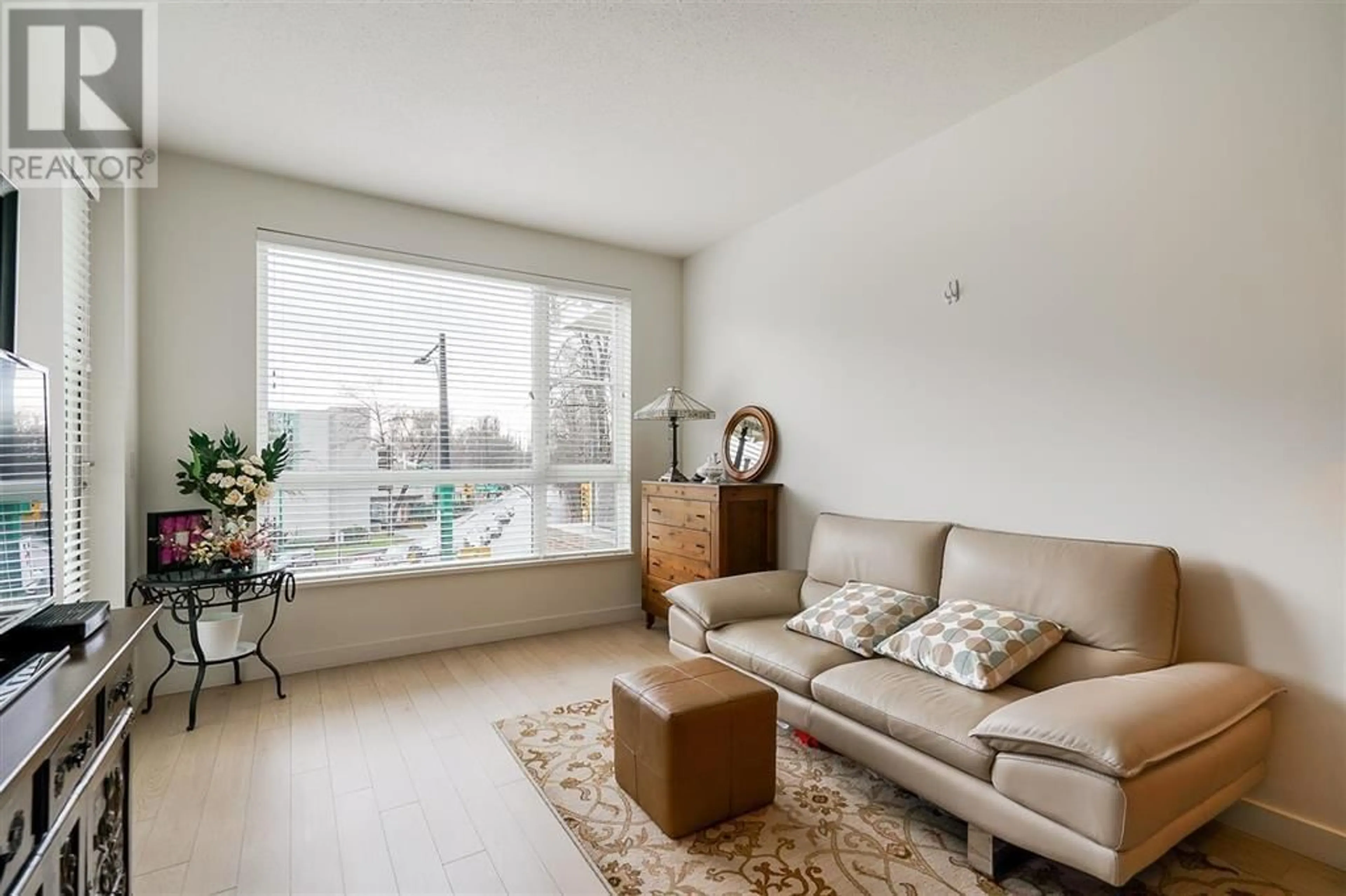 Living room with furniture, unknown for 211 - 1621 HAMILTON AVENUE, North Vancouver British Columbia V7P0B7