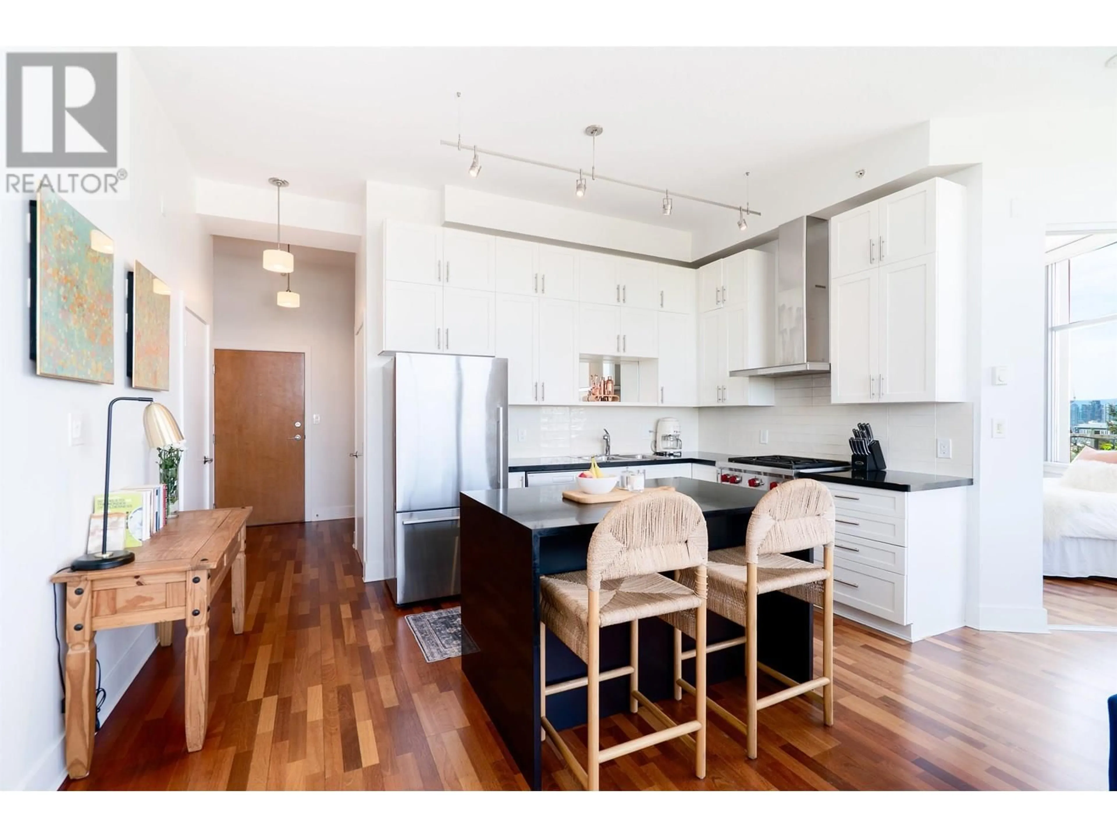 Open concept kitchen, wood/laminate floor for 607 - 2635 PRINCE EDWARD STREET, Vancouver British Columbia V5T4V7