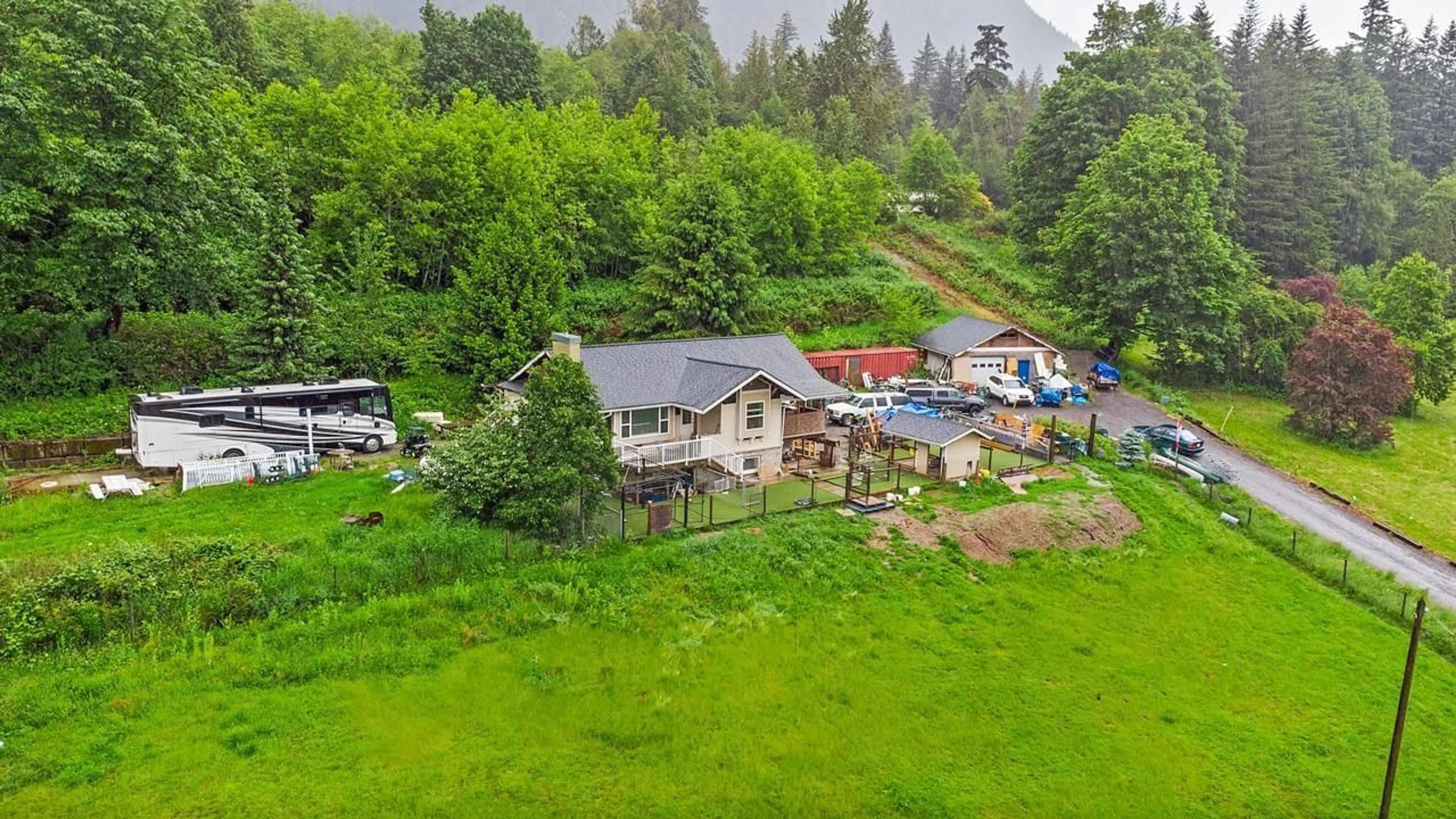 A pic from outside/outdoor area/front of a property/back of a property/a pic from drone, mountain view for 42095 HUSBAND, Mission British Columbia V0M1G0