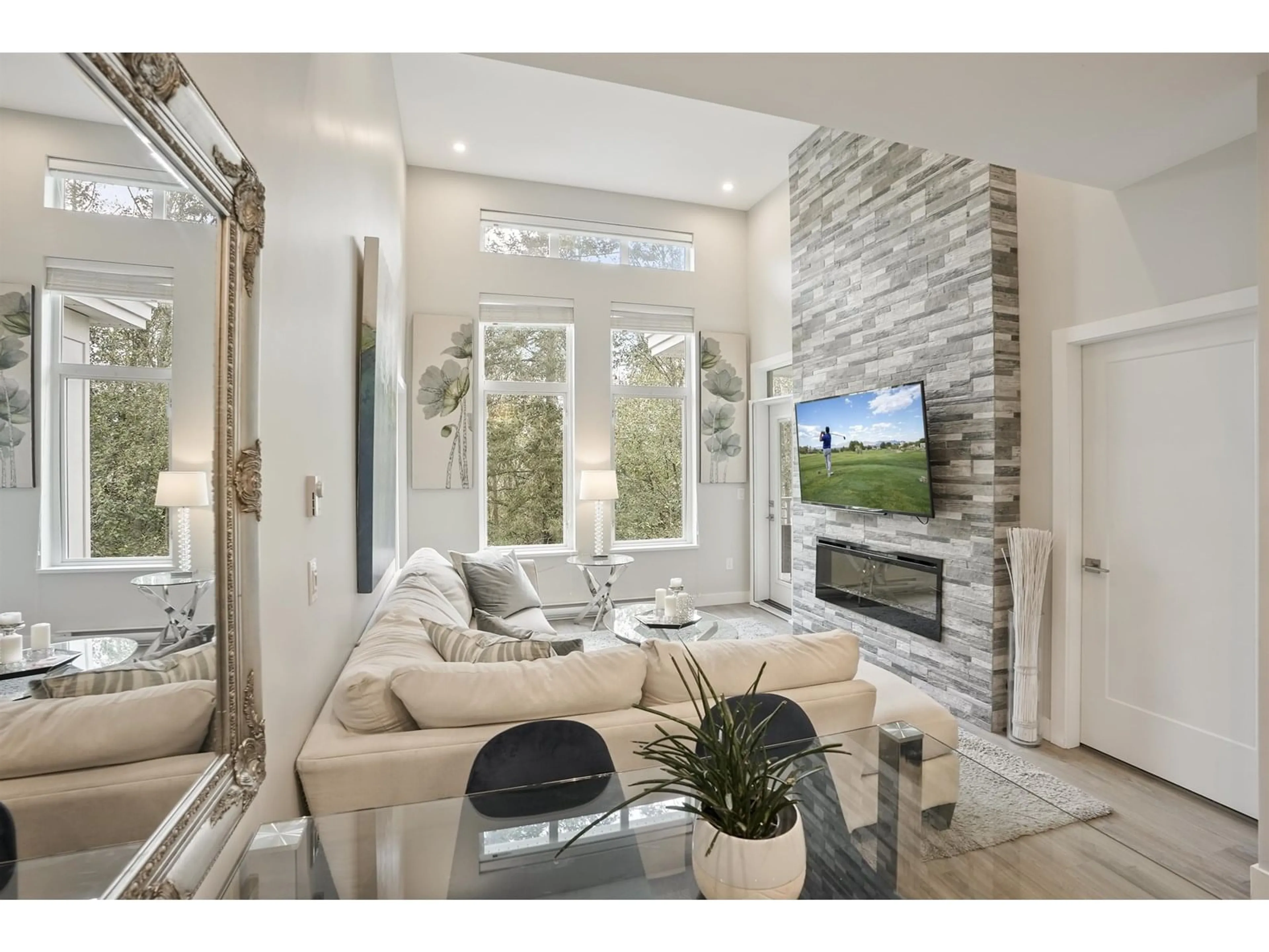 Living room with furniture, ceramic/tile floor for 405 - 15436 31, Surrey British Columbia V3Z1H3