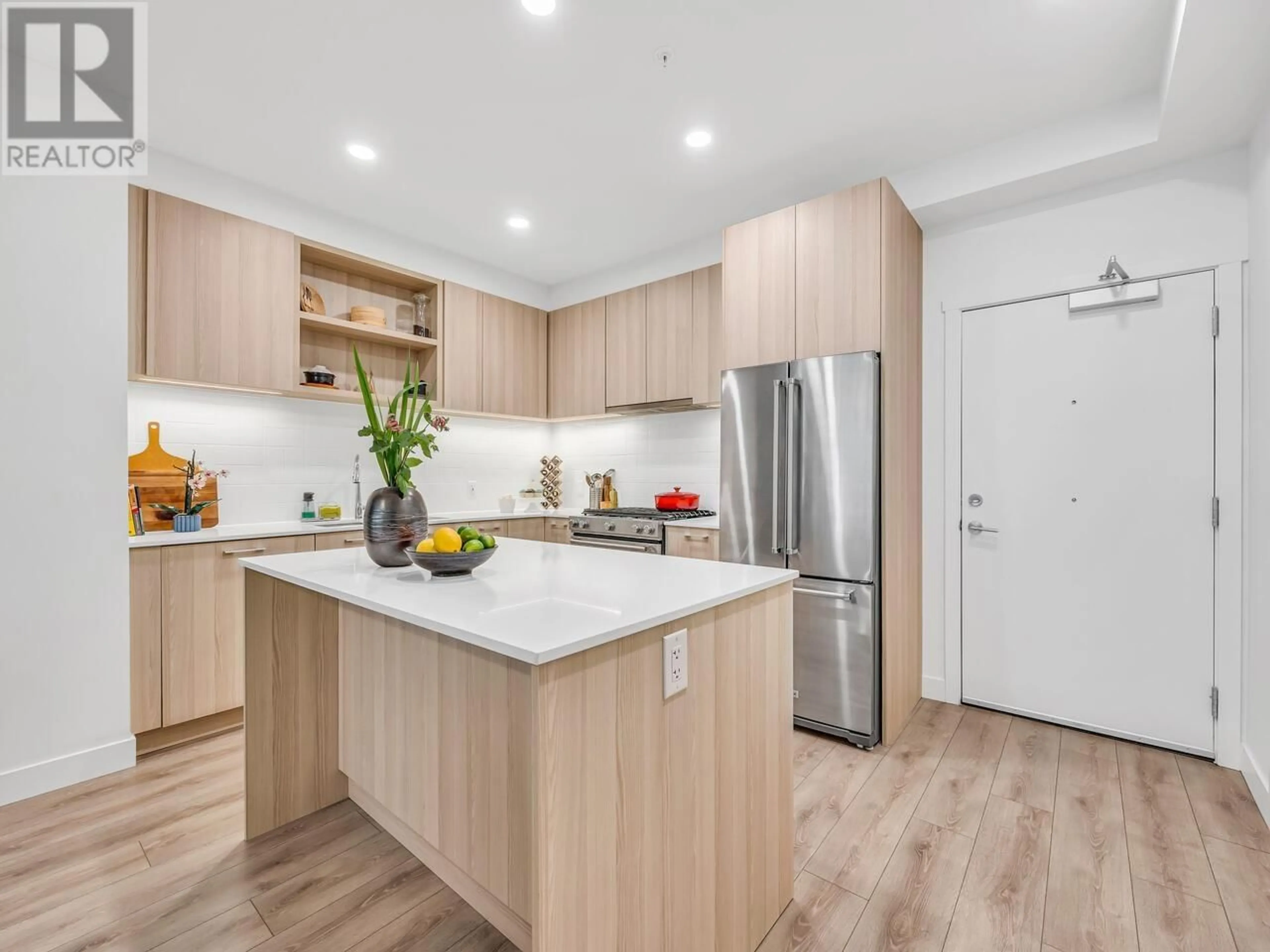 Open concept kitchen, wood/laminate floor for 218 - 735 ANSKAR COURT, Coquitlam British Columbia V3J0L7