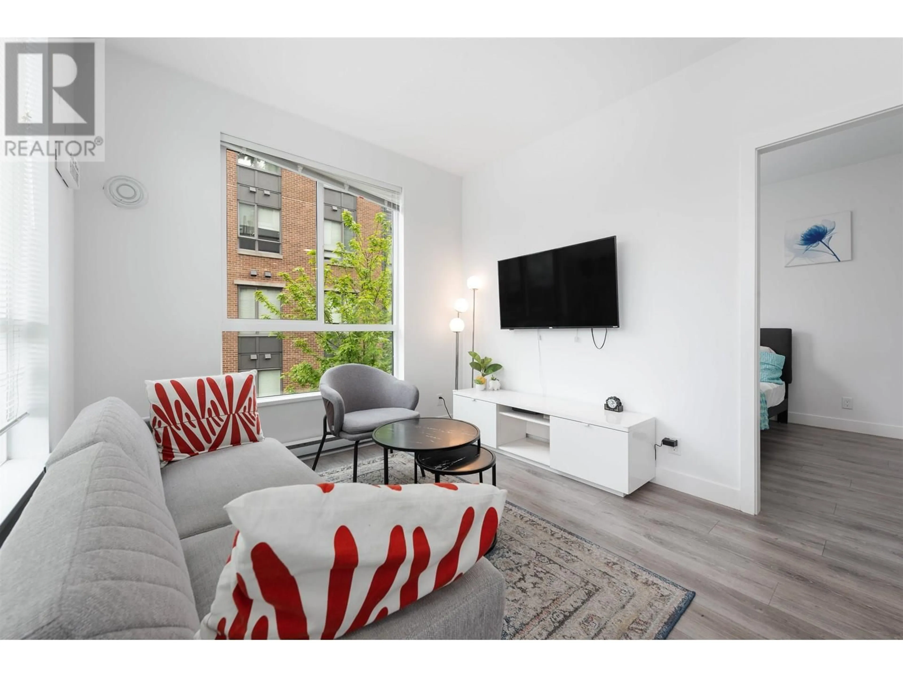 Living room with furniture, unknown for 313 - 700 CLARKE ROAD, Coquitlam British Columbia V3J0K5
