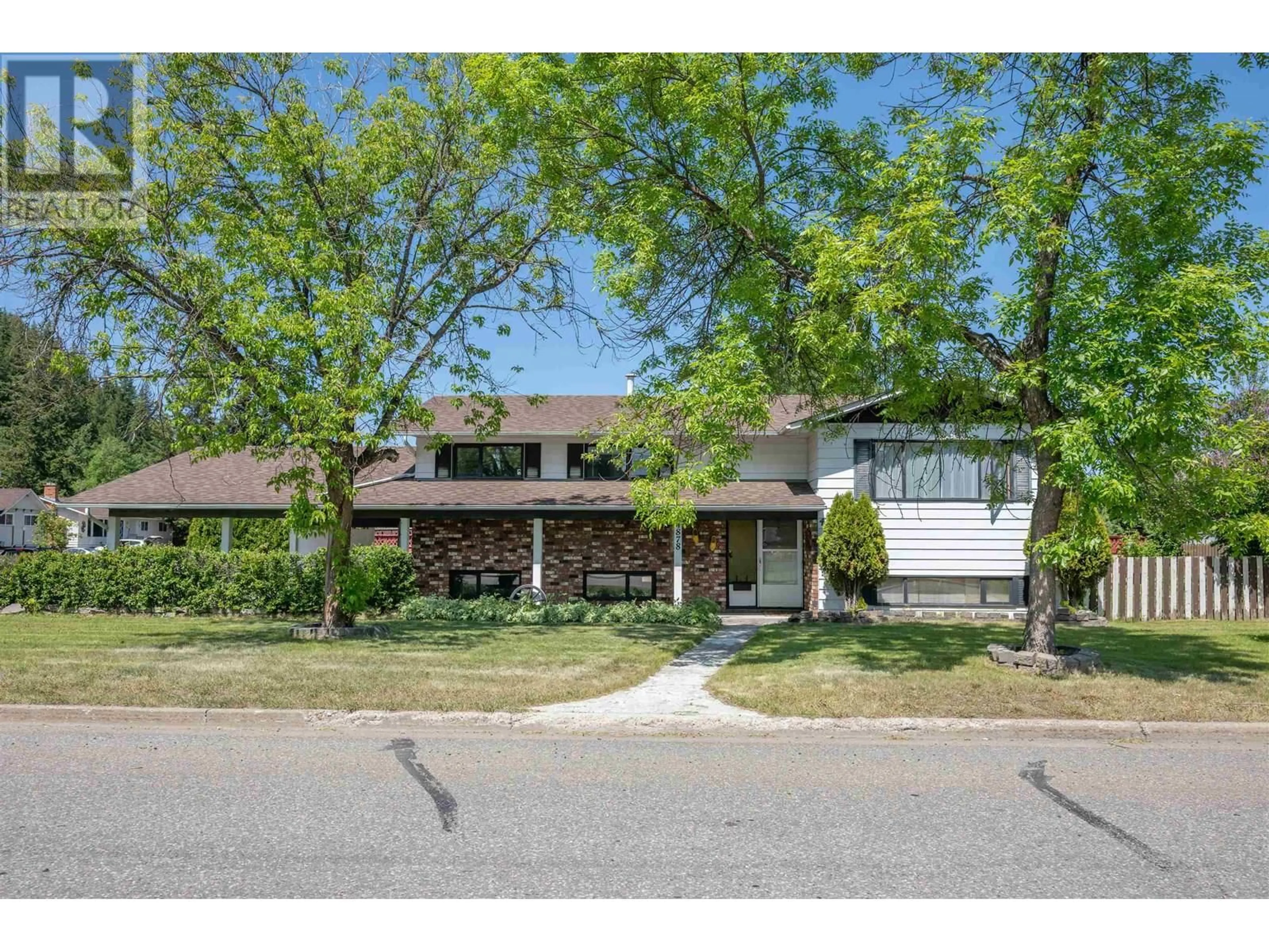 Home with brick exterior material, street for 4878 1ST AVENUE, Prince George British Columbia V2M6E5