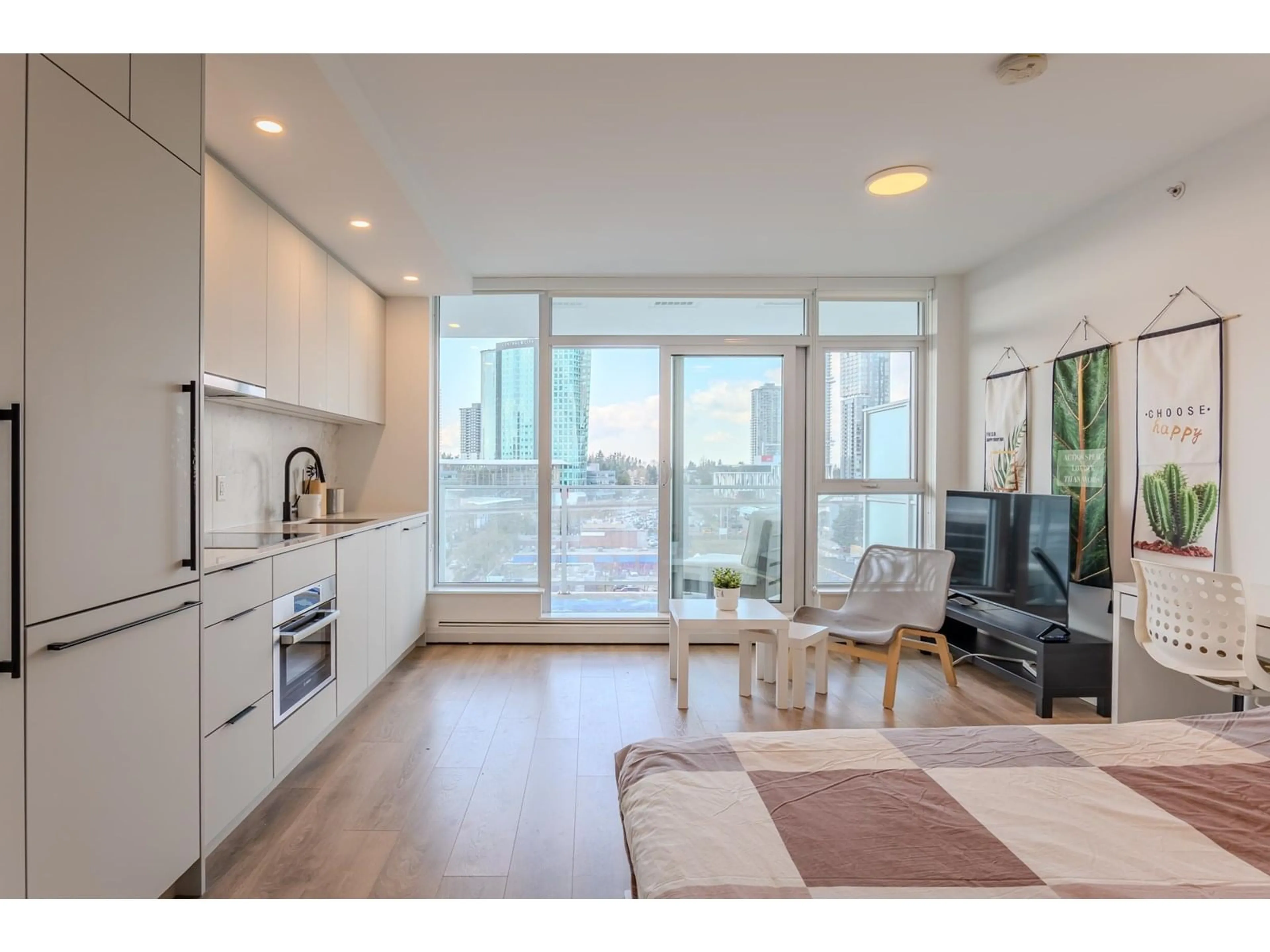 Open concept kitchen, wood/laminate floor for 909 - 13685 102, Surrey British Columbia V3T0S2