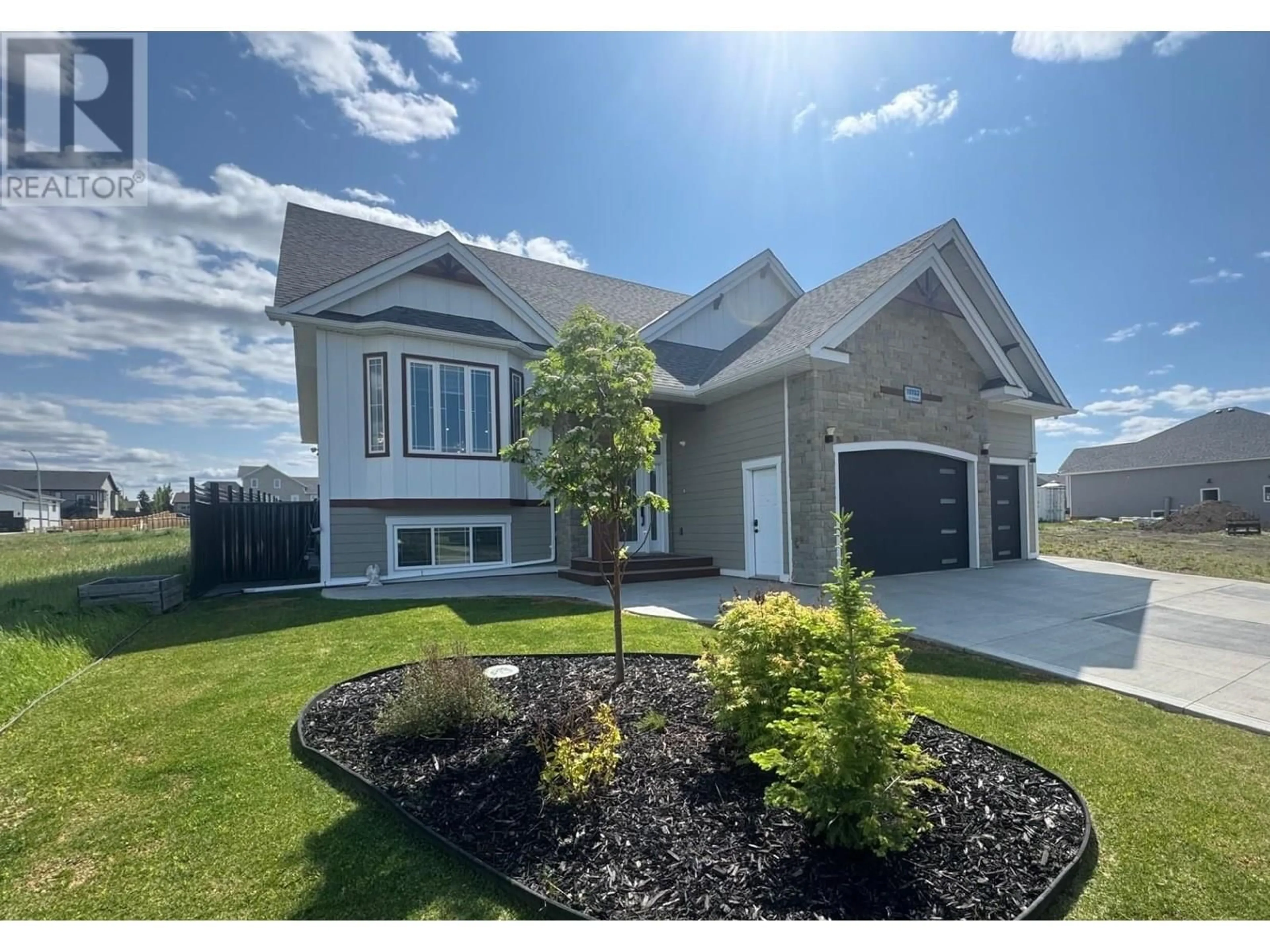 Home with vinyl exterior material, unknown for 10703 111 STREET, Fort St. John British Columbia V1J0N3