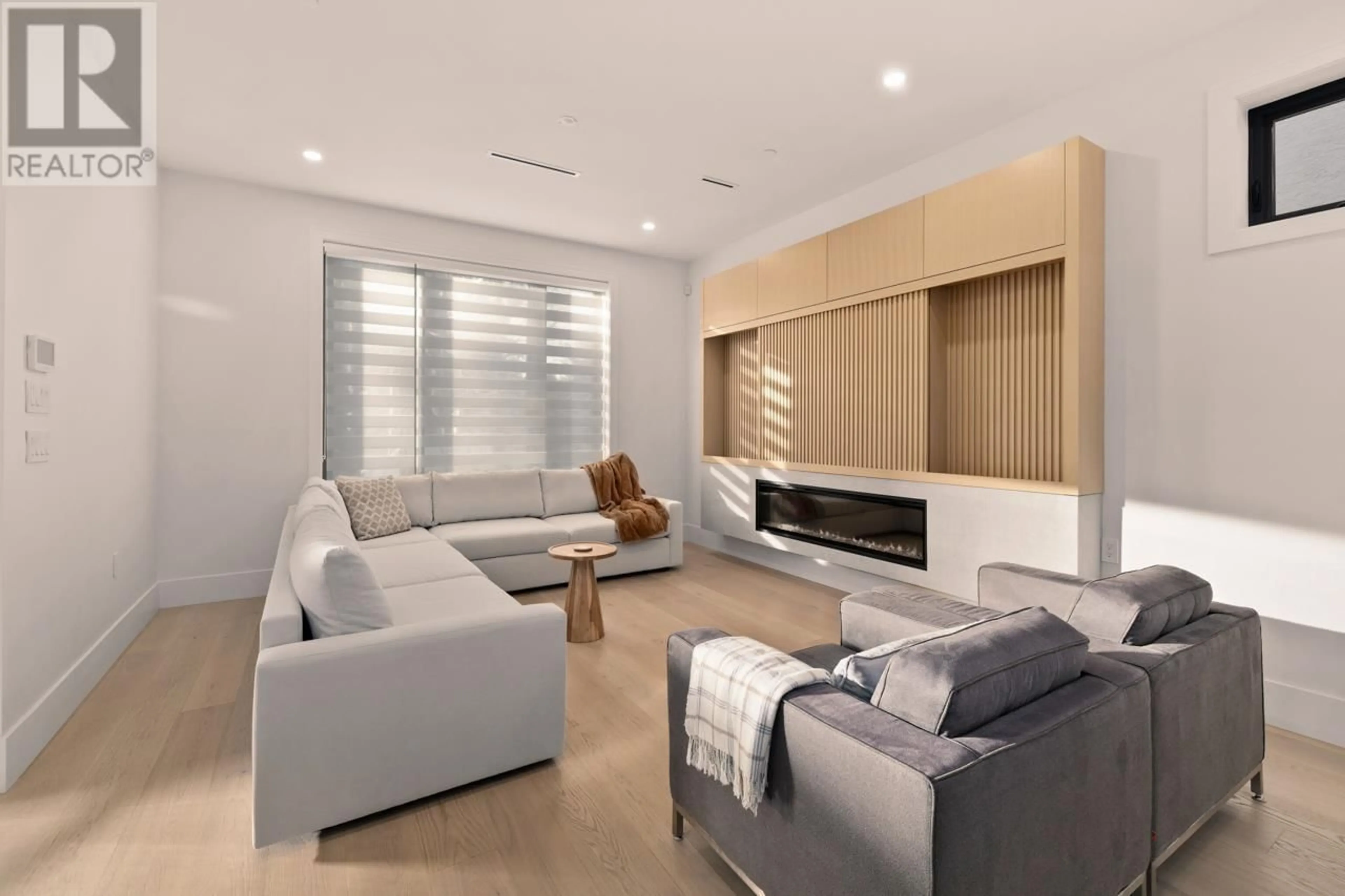 Living room with furniture, wood/laminate floor for 6408 VINE STREET, Vancouver British Columbia V6M4B1