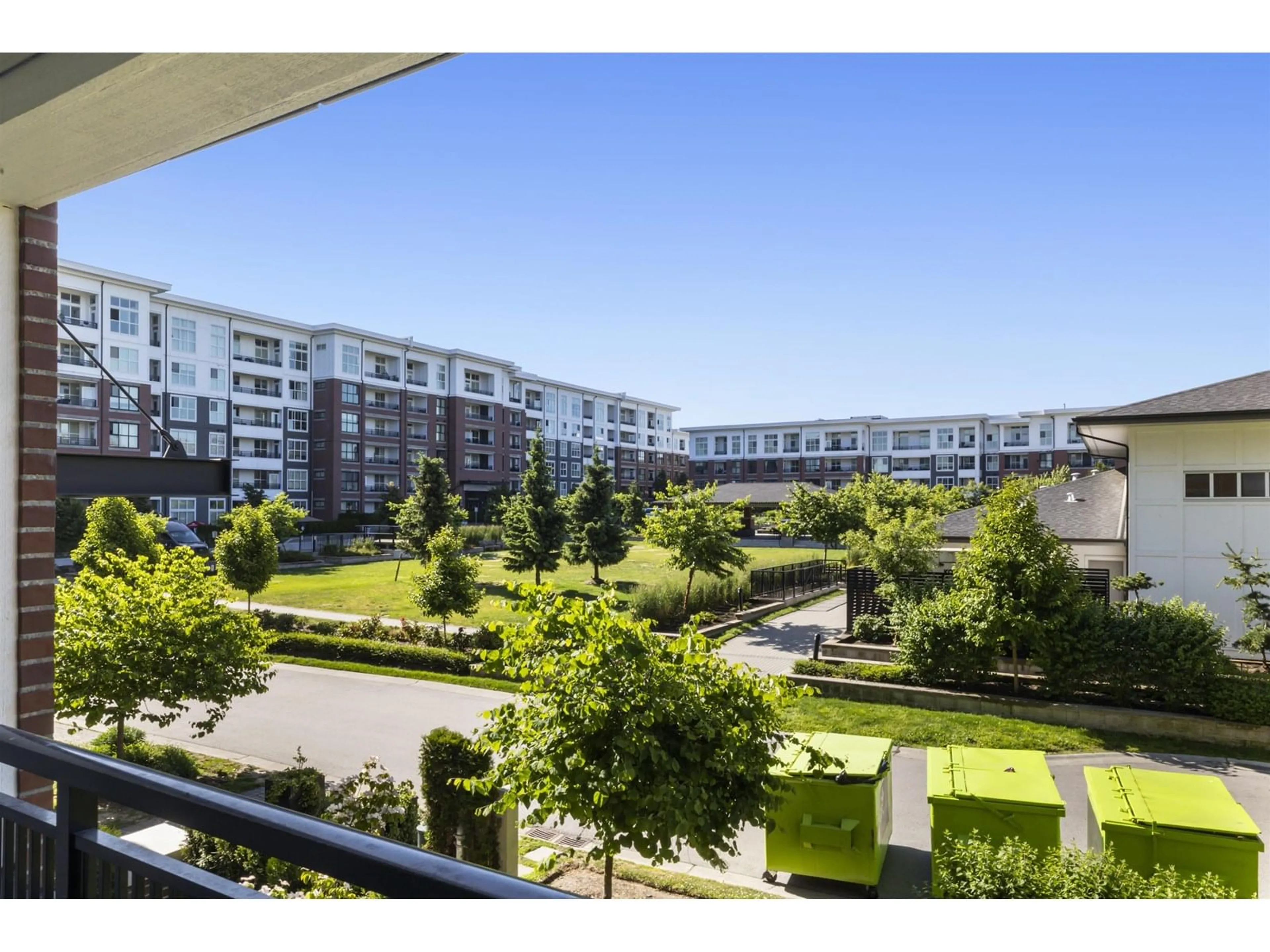 A pic from outside/outdoor area/front of a property/back of a property/a pic from drone, city buildings view from balcony for B201 - 8150 207, Langley British Columbia V2Y4J3