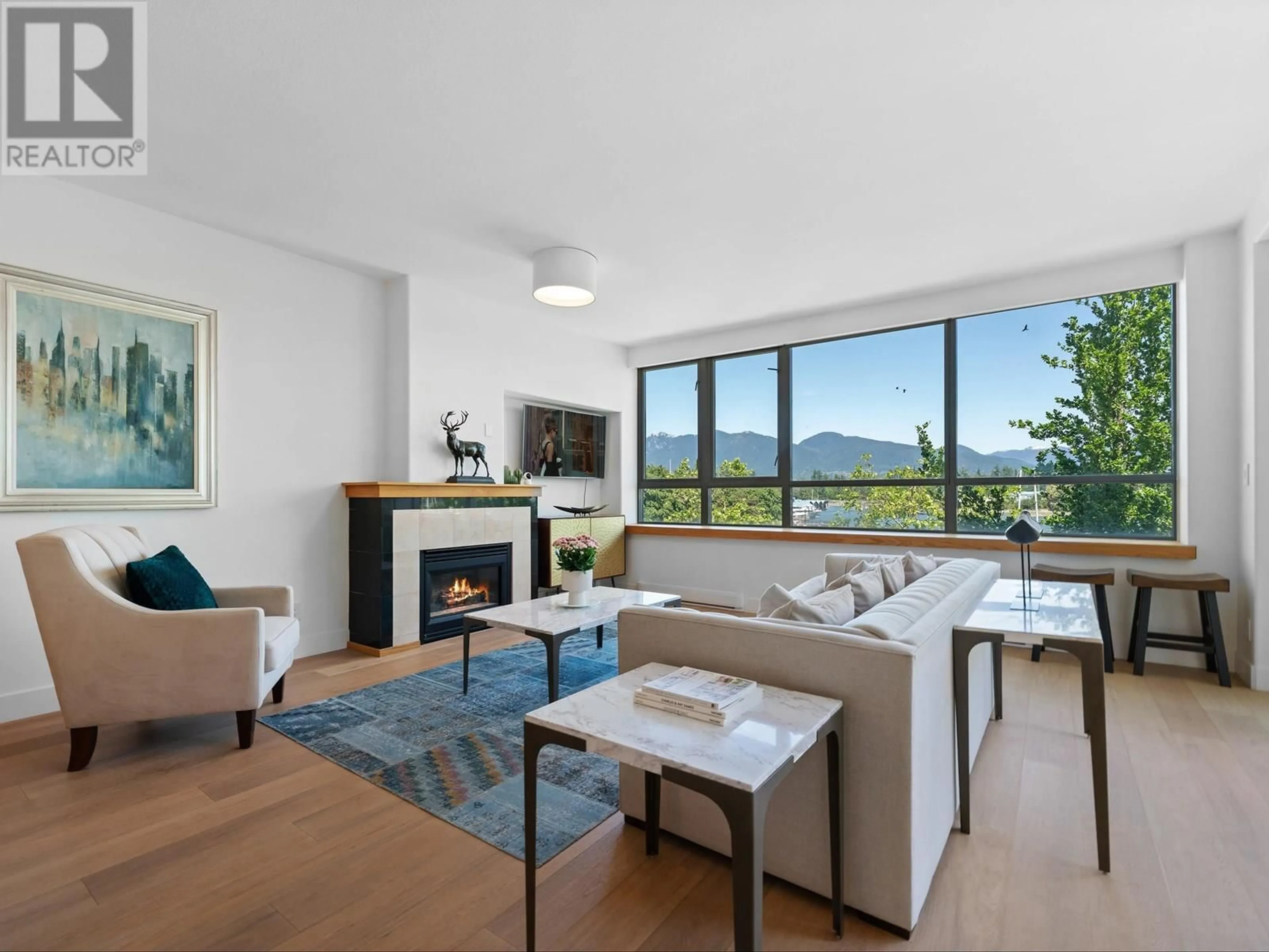 Living room with furniture, wood/laminate floor for L302 - 1550 COAL HARBOUR QUAY, Vancouver British Columbia V6G3G1