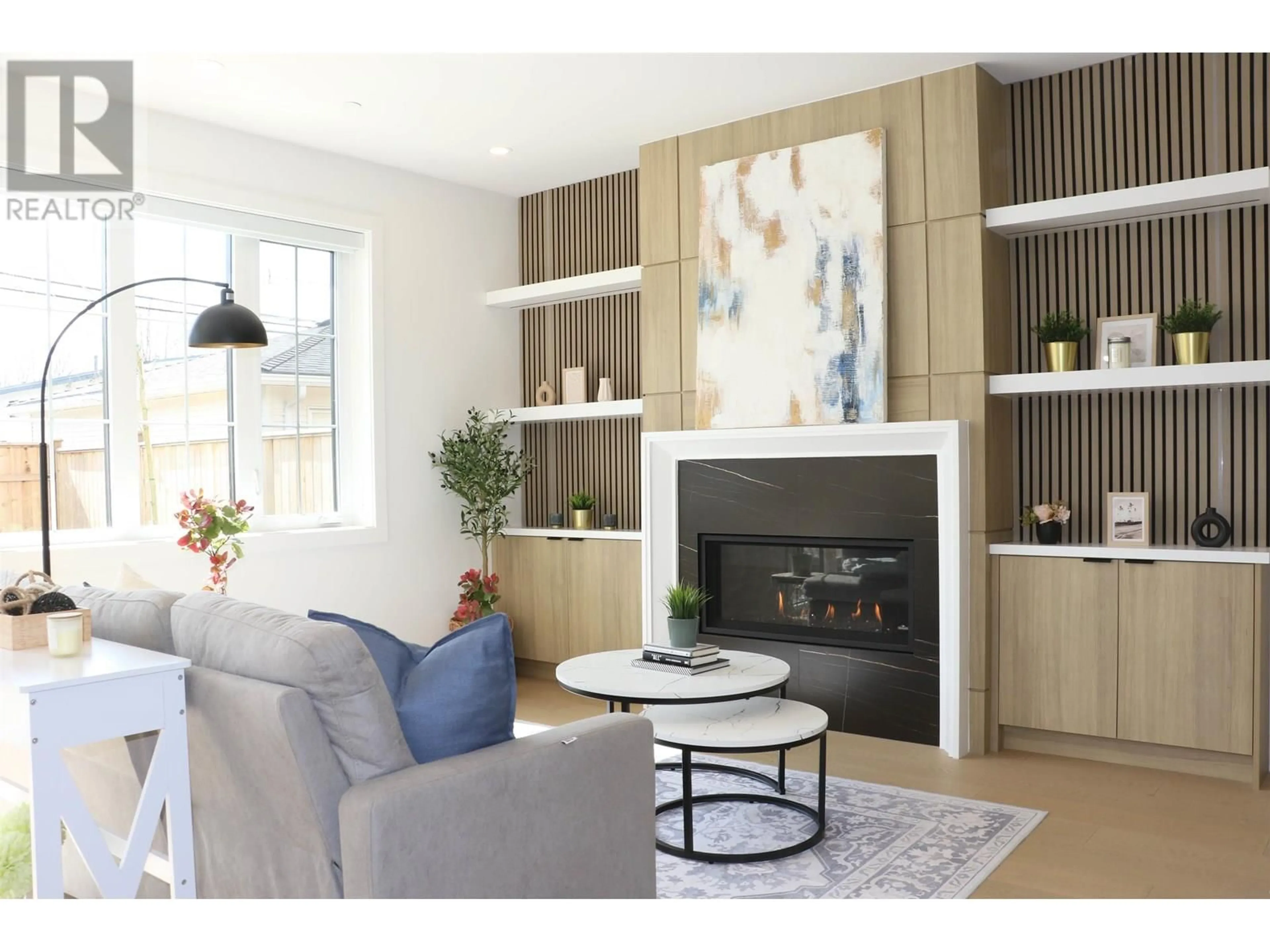 Living room with furniture, wood/laminate floor for 848 38TH AVENUE, Vancouver British Columbia V5W1J3