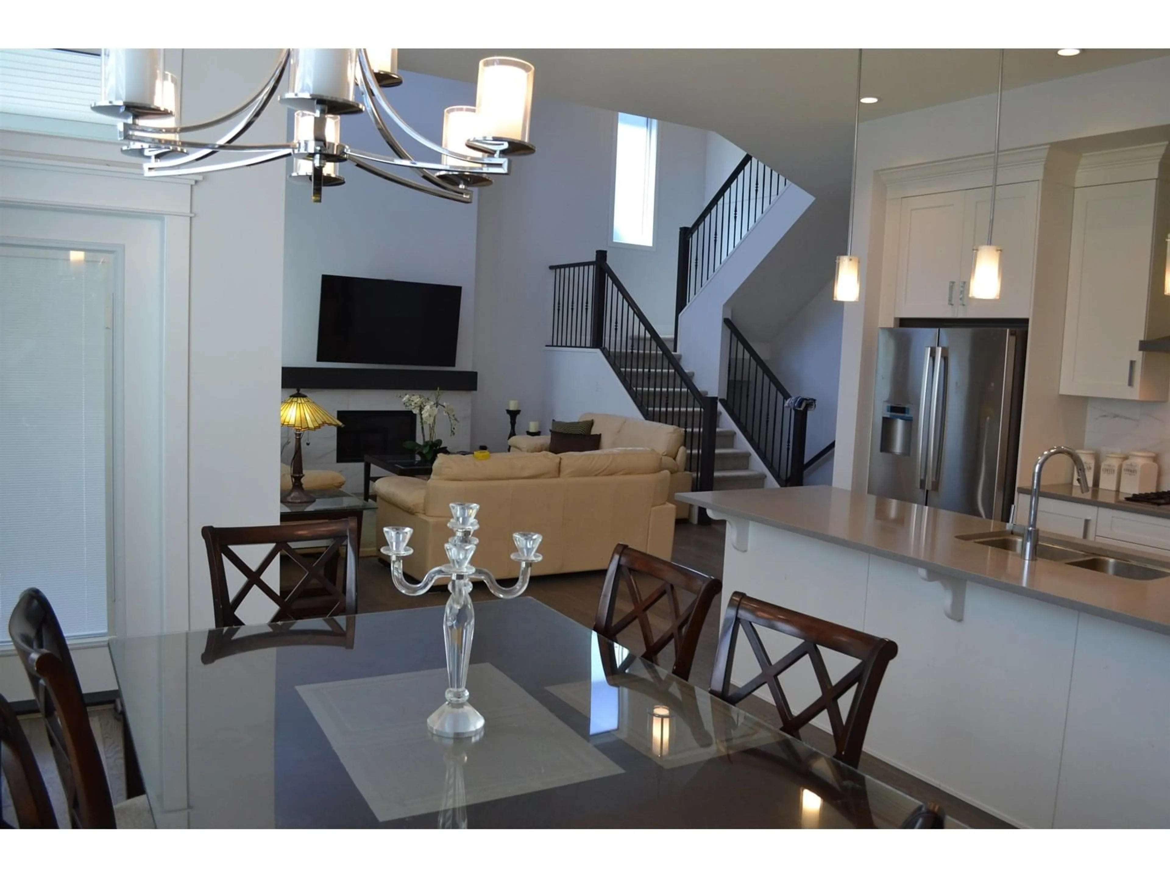 Open concept kitchen, wood/laminate floor for 2122 167, Surrey British Columbia V3Z9X9