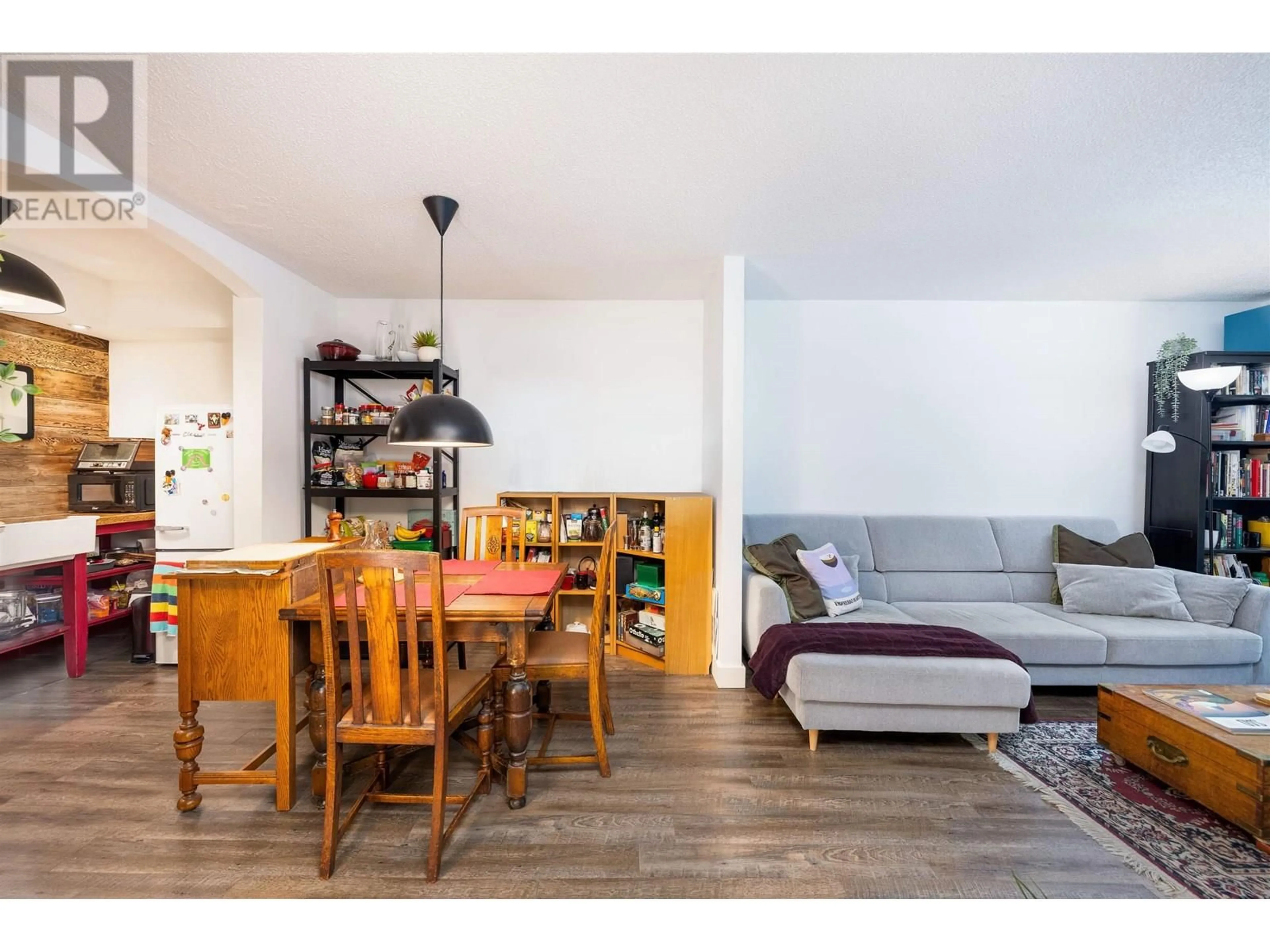 Living room with furniture, wood/laminate floor for 201 - 1515 5TH AVENUE, Vancouver British Columbia V5N1L6