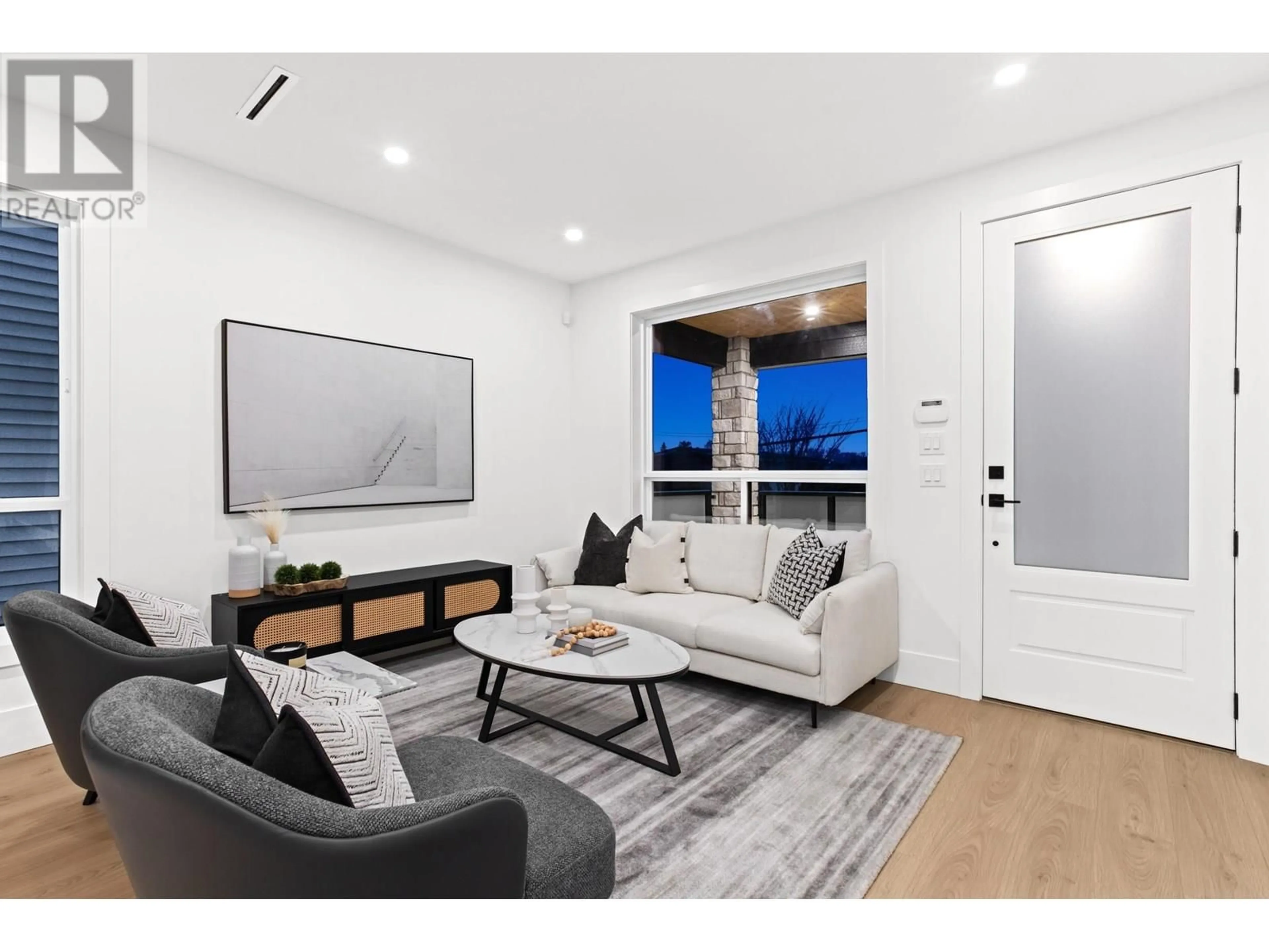Living room with furniture, wood/laminate floor for 211 JARDINE STREET, New Westminster British Columbia V3M5M4