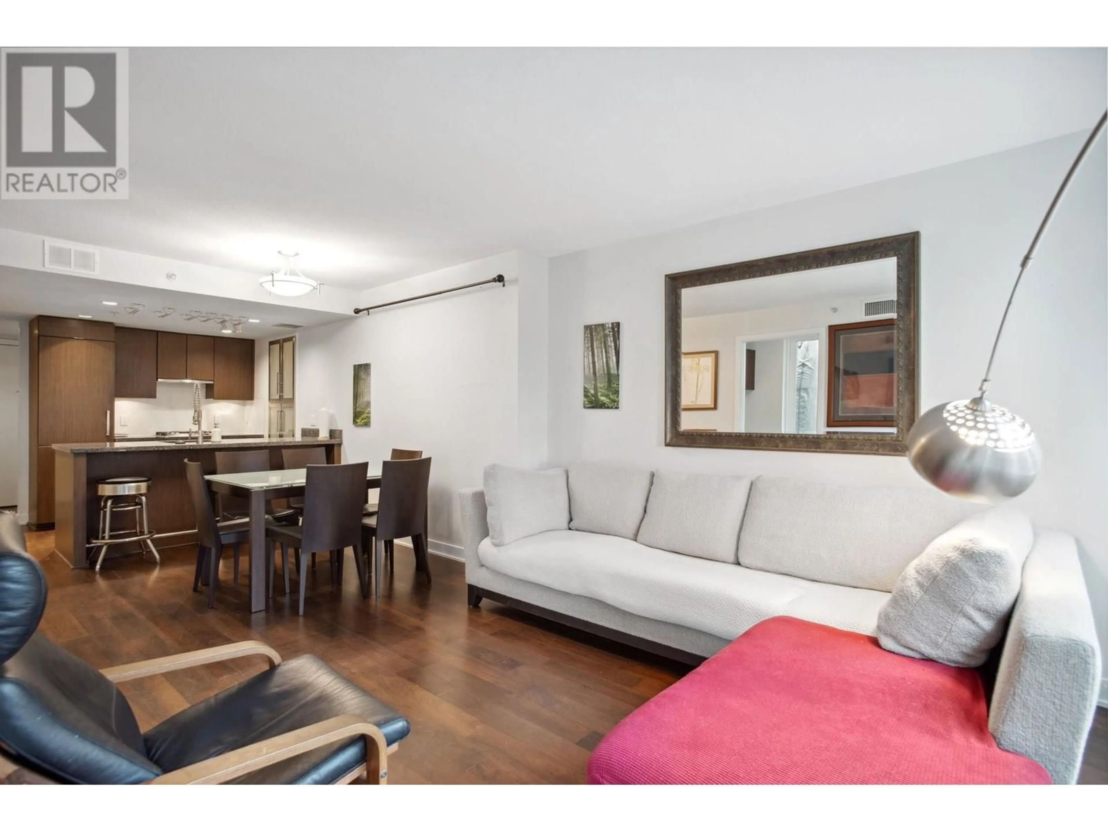 Living room with furniture, wood/laminate floor for 609 - 1055 RICHARDS STREET, Vancouver British Columbia V6B0C2