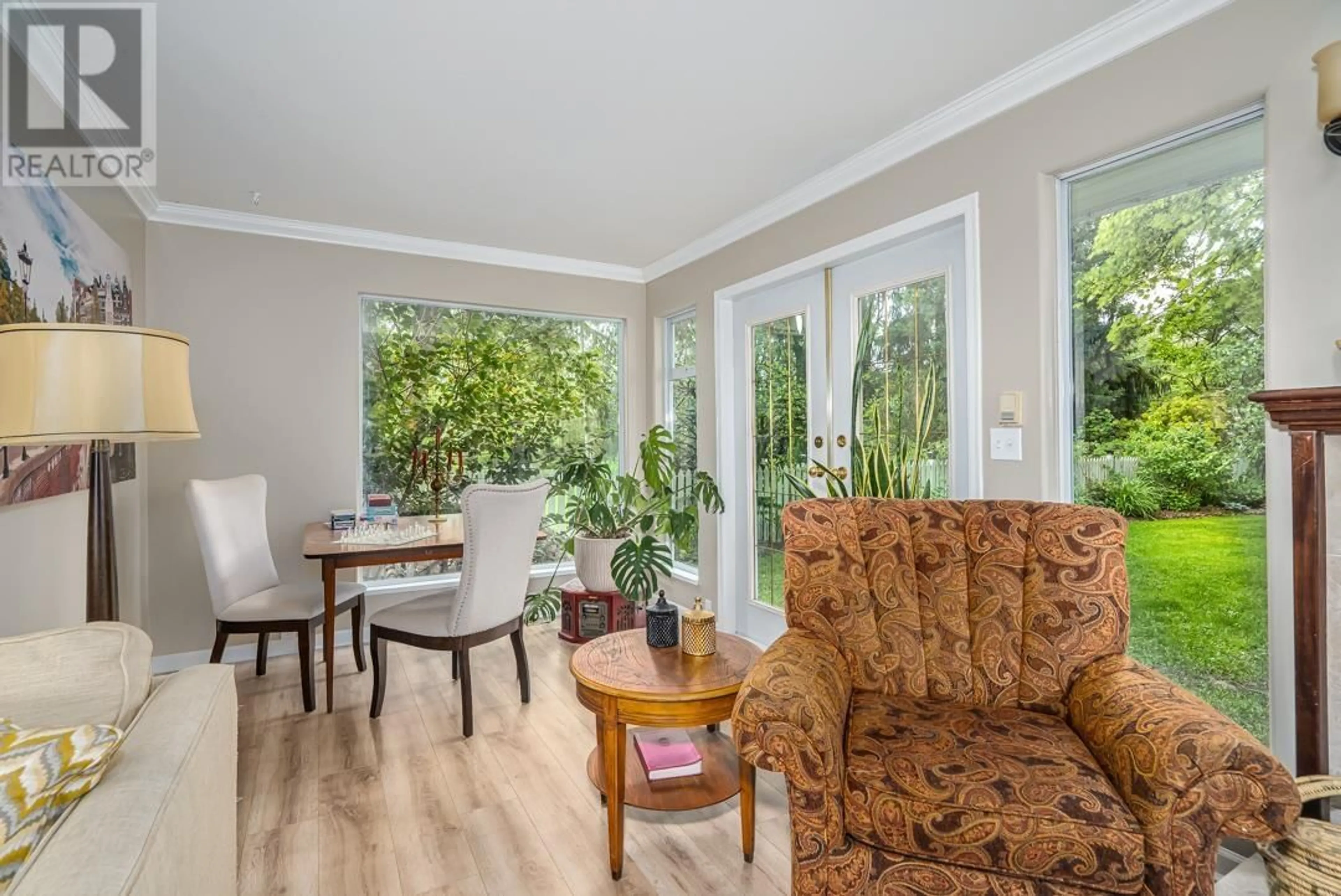 Living room with furniture, wood/laminate floor for 21968 127TH AVENUE, Maple Ridge British Columbia V2X4P5