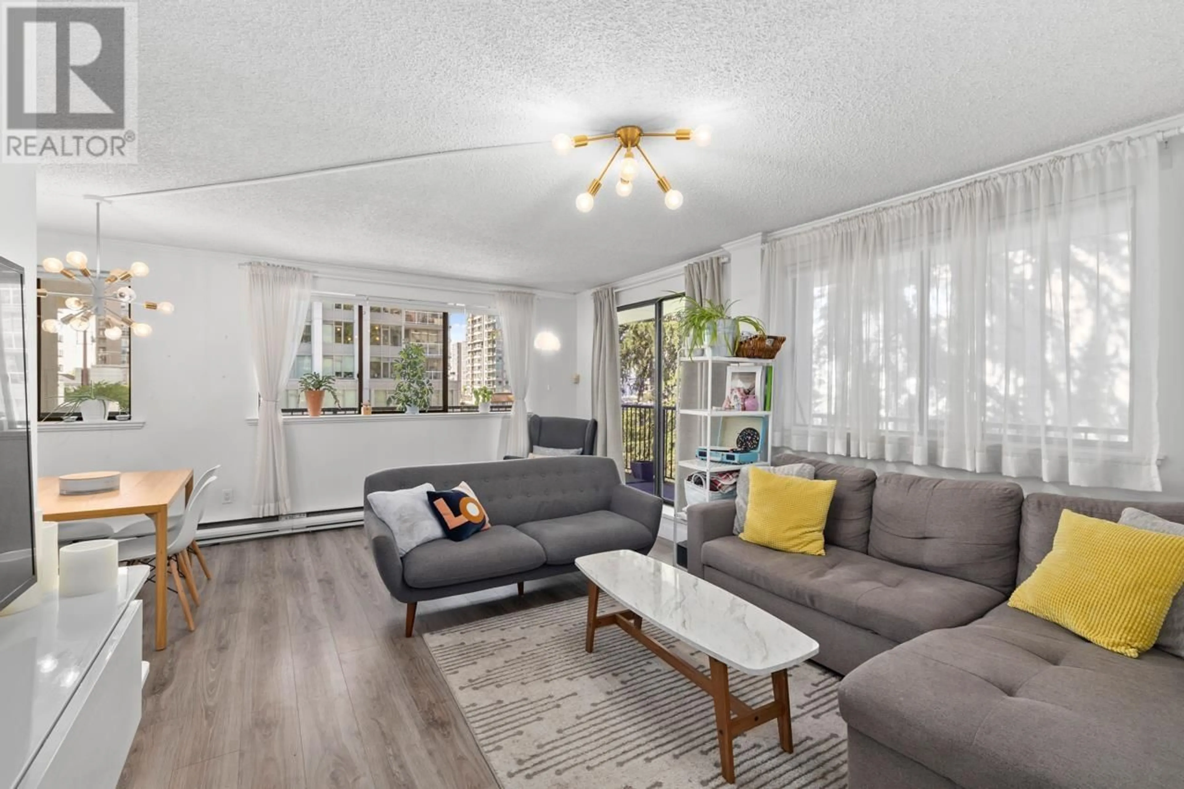 Living room with furniture, unknown for 201 - 150 15TH STREET, North Vancouver British Columbia V7L4N9