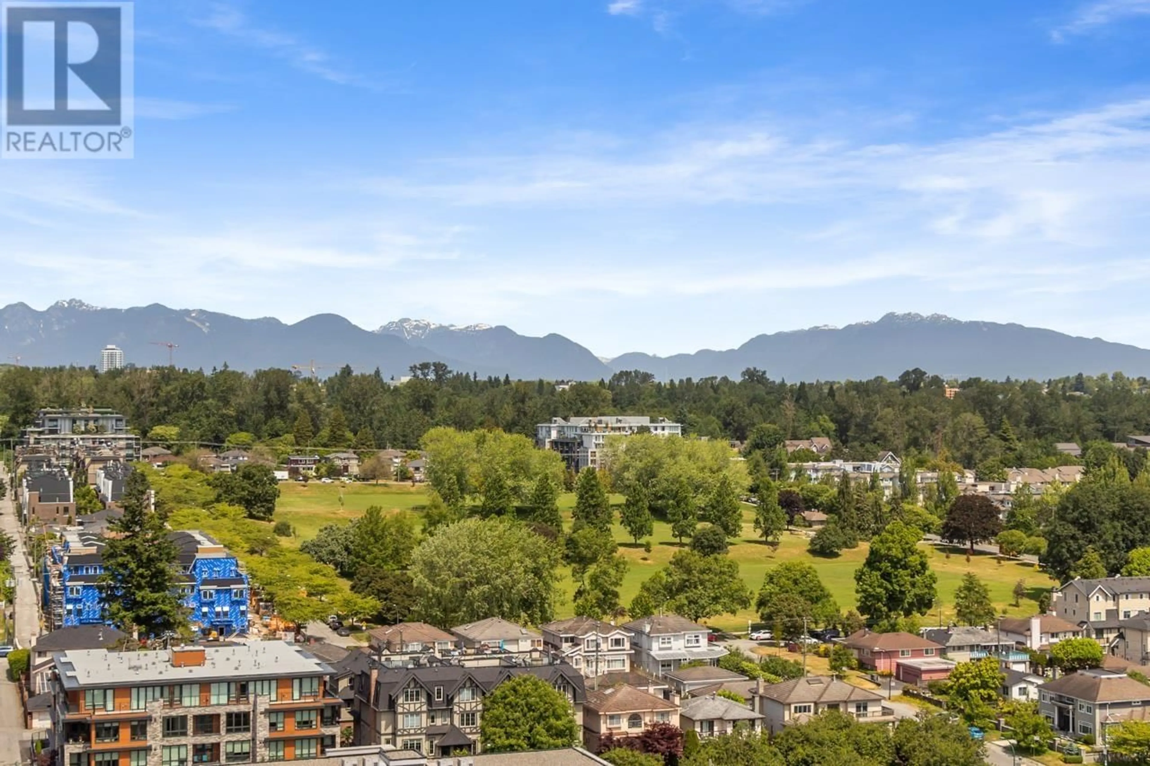 A pic from outside/outdoor area/front of a property/back of a property/a pic from drone, mountain view for 1904 - 8031 NUNAVUT LANE, Vancouver British Columbia V5X0C9