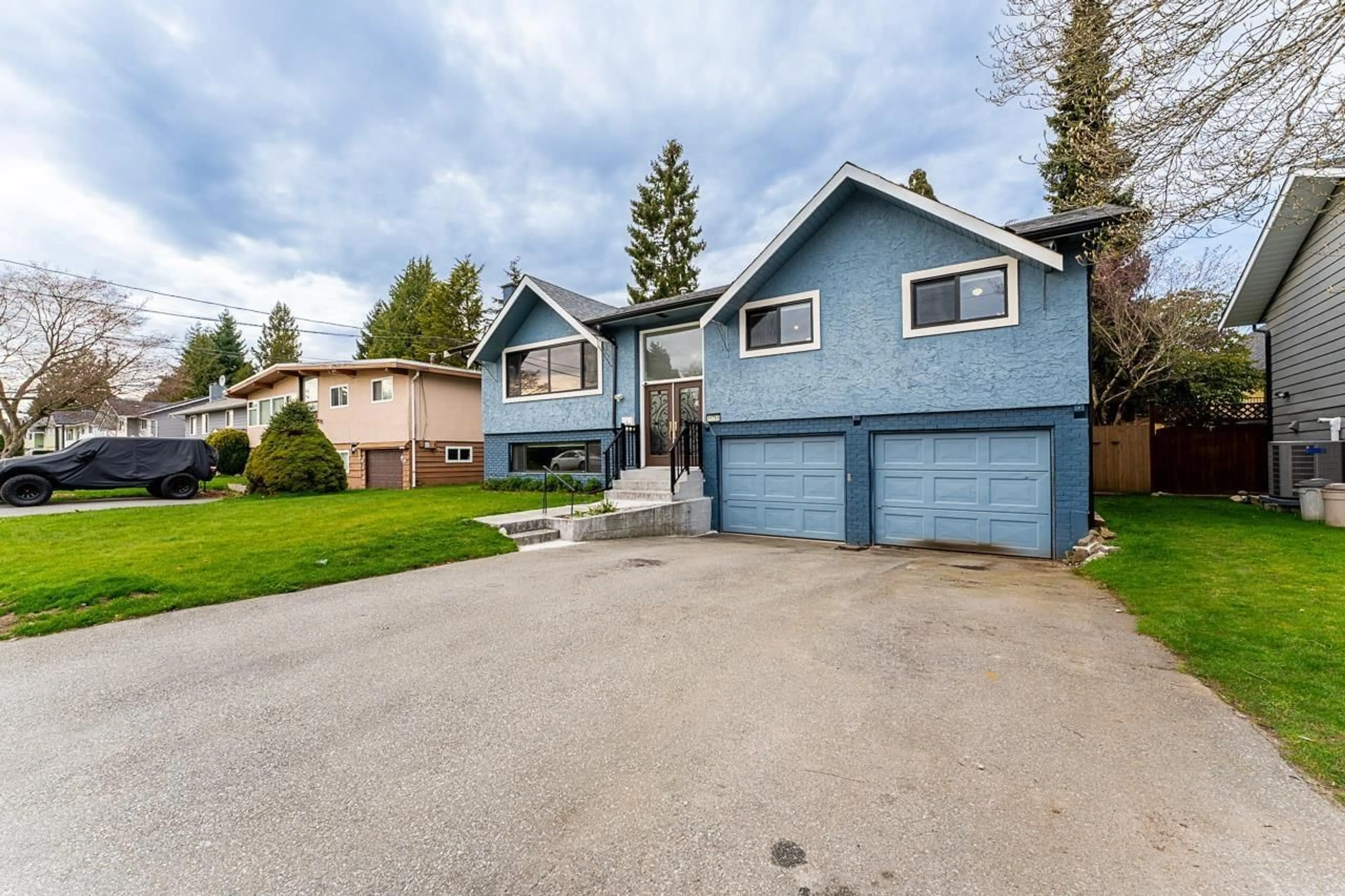 Home with vinyl exterior material, street for 11769 83, Delta British Columbia V4C2H3