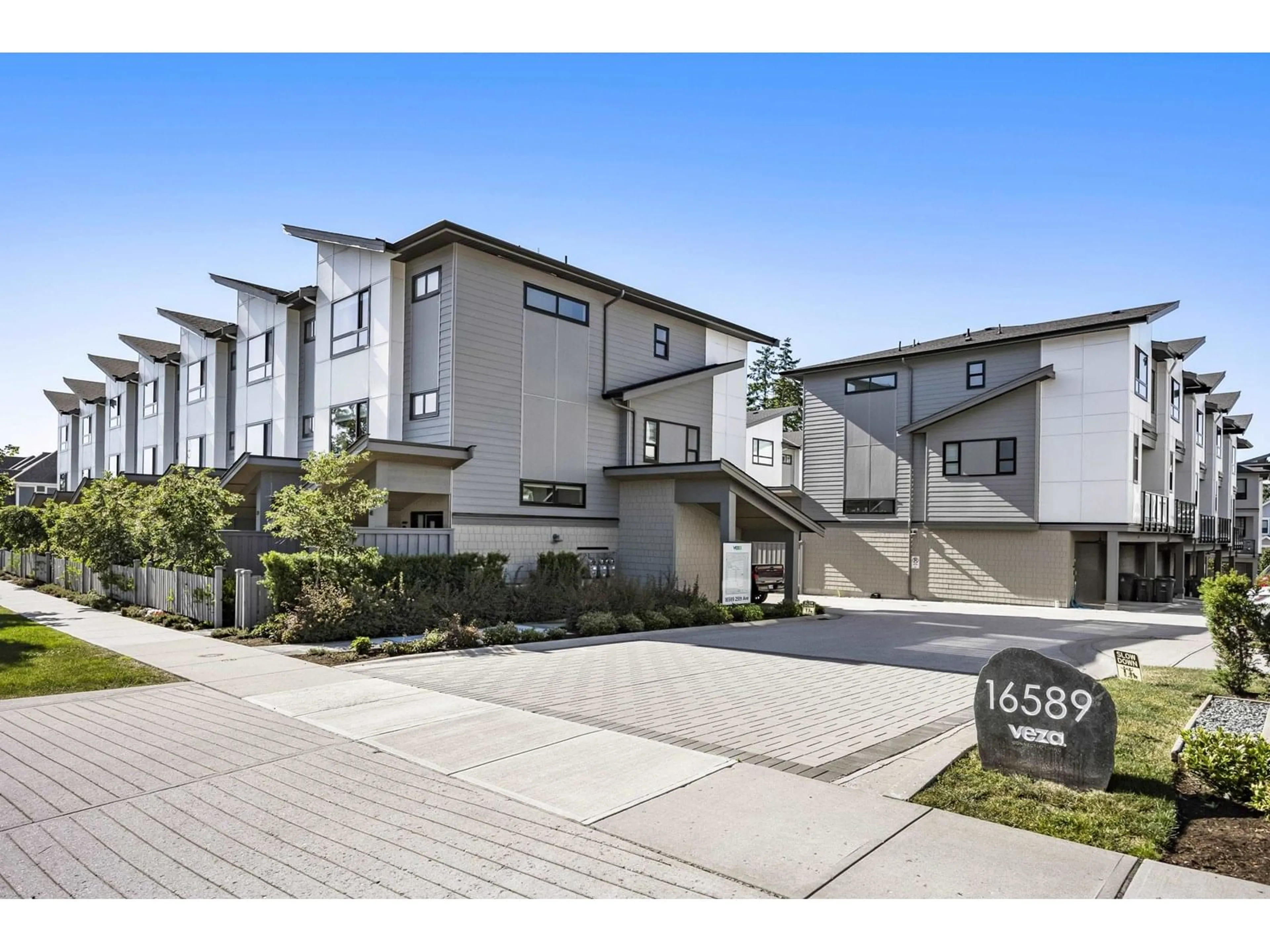 A pic from outside/outdoor area/front of a property/back of a property/a pic from drone, street for 31 - 16589 25, Surrey British Columbia V3Z1H5