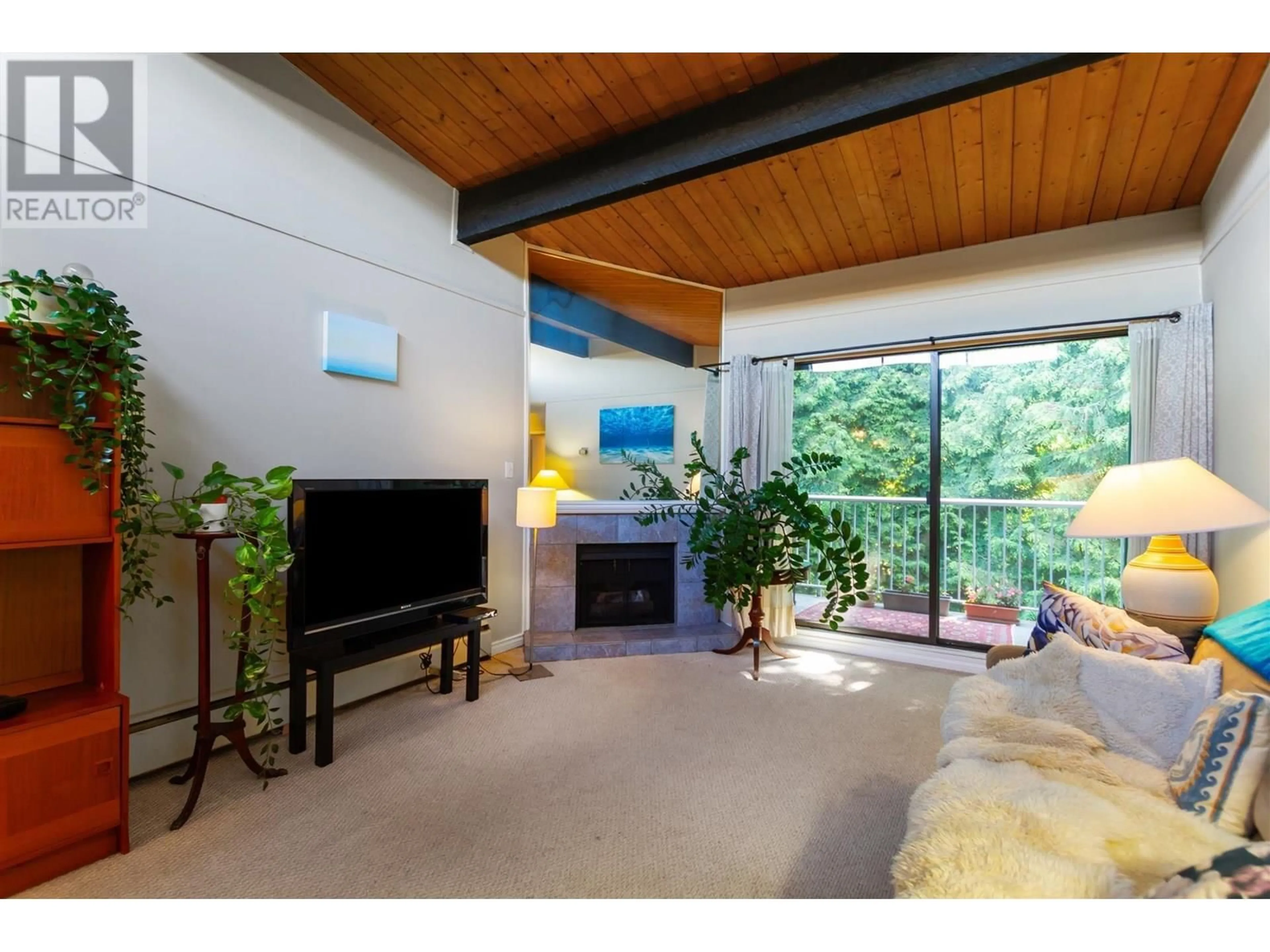 Living room with furniture, unknown for 302 - 3901 CARRIGAN COURT, Burnaby British Columbia V3N4K1