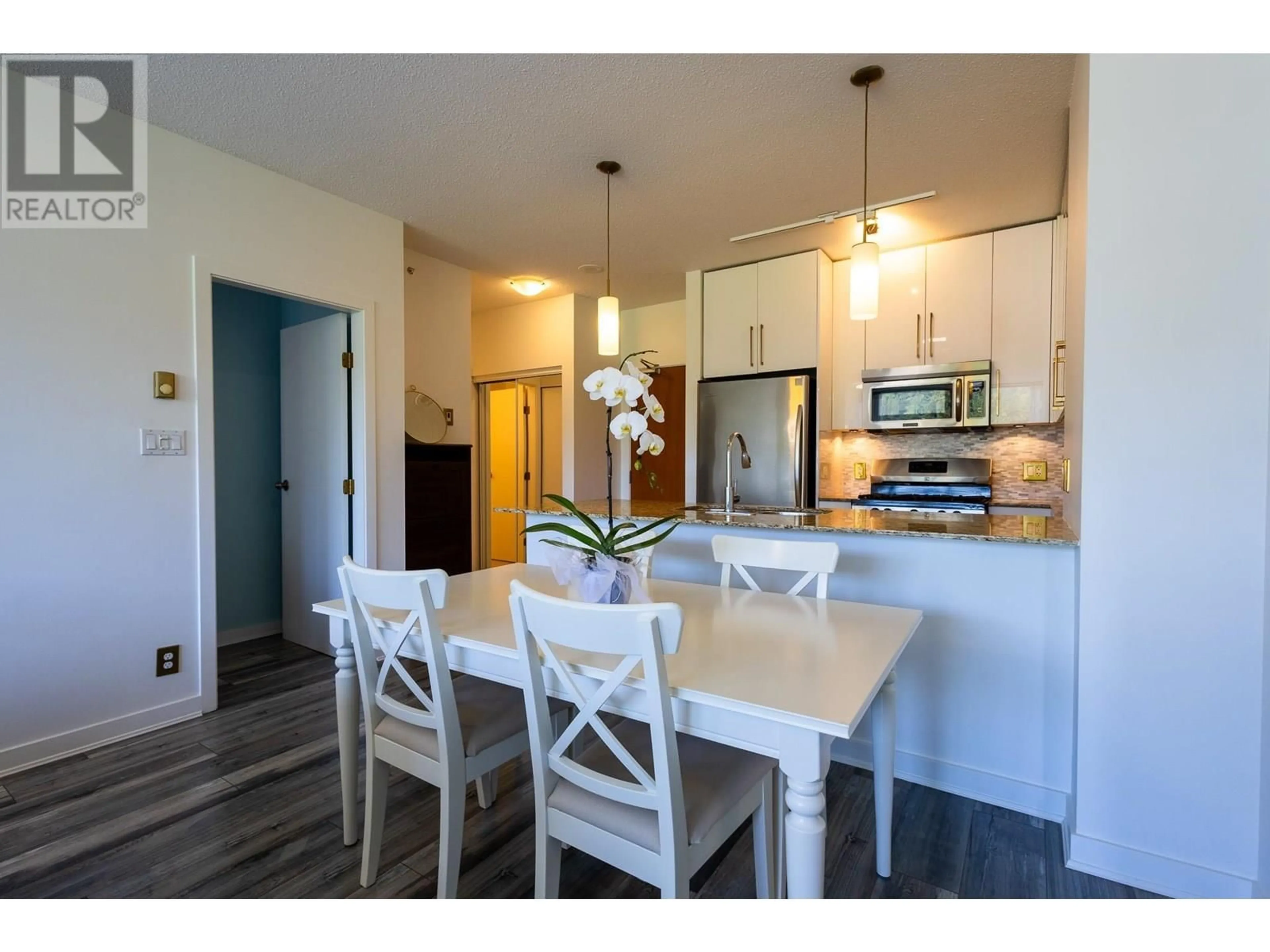 Open concept kitchen, wood/laminate floor for 507 - 110 BREW STREET, Port Moody British Columbia V3H0E4