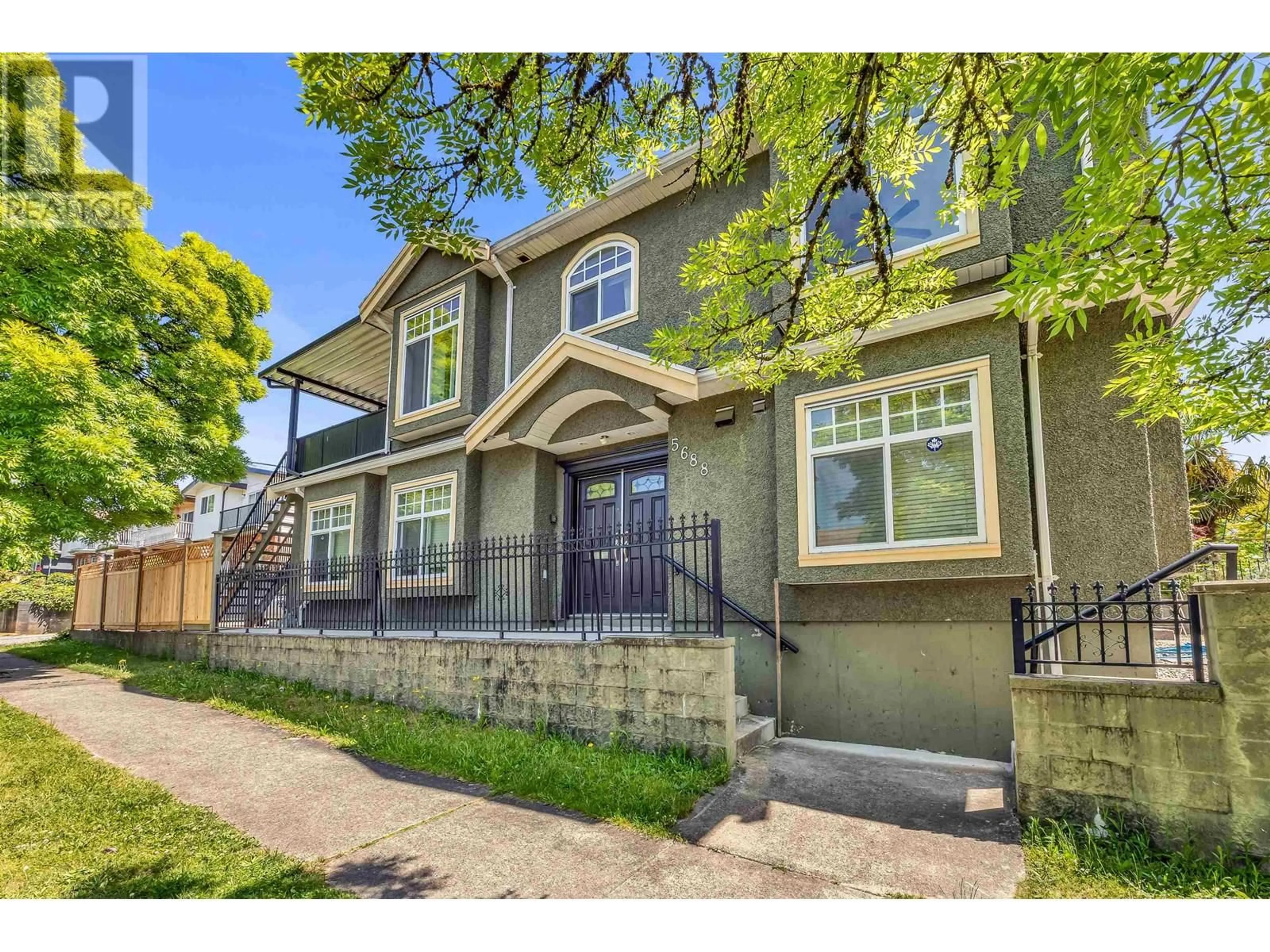Home with brick exterior material, street for 5688 SHERBROOKE STREET, Vancouver British Columbia V5W1R3