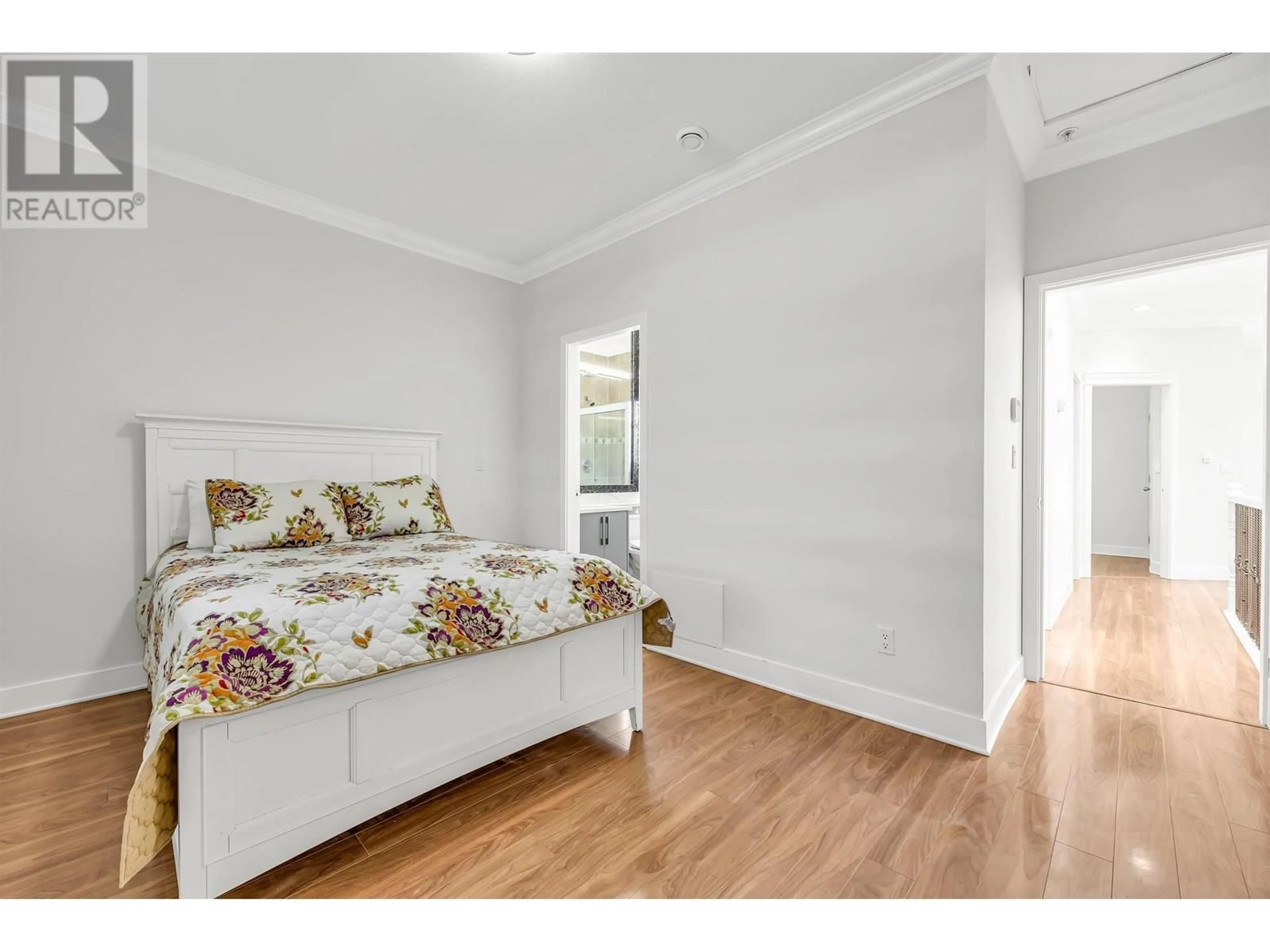 Bedroom with bed, wood/laminate floor for 5688 SHERBROOKE STREET, Vancouver British Columbia V5W1R3