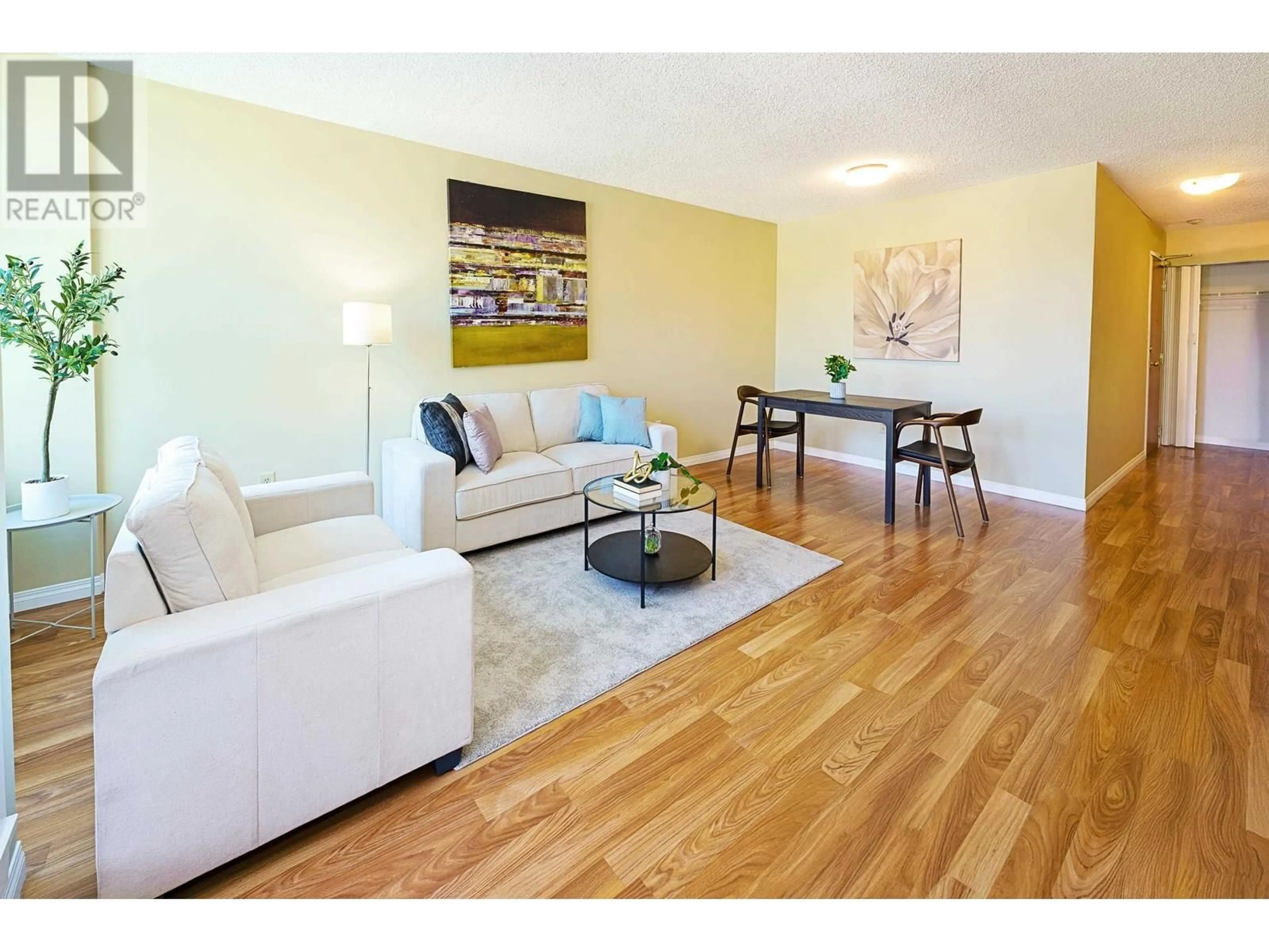 Living room with furniture, wood/laminate floor for 402 - 1845 ROBSON STREET, Vancouver British Columbia V8G1E4