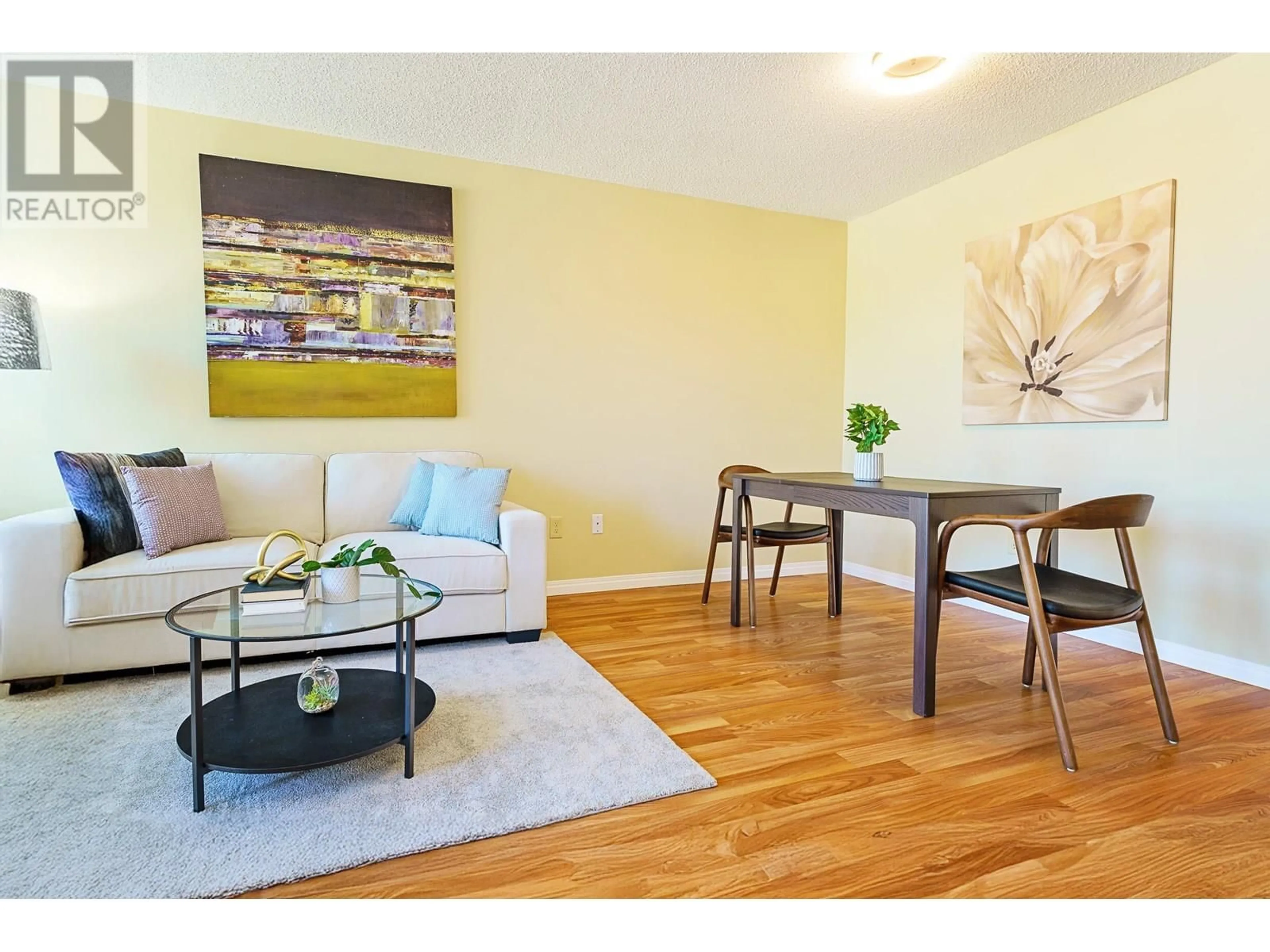 Living room with furniture, wood/laminate floor for 402 - 1845 ROBSON STREET, Vancouver British Columbia V8G1E4
