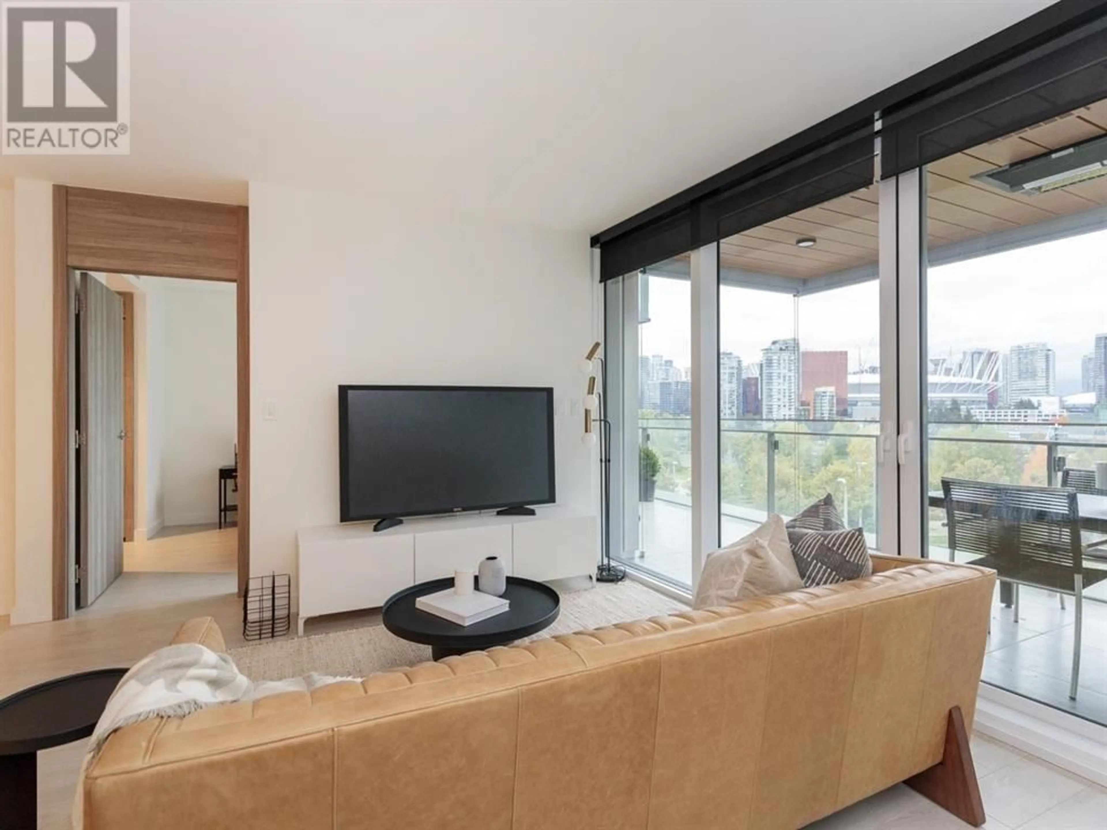 Living room with furniture, unknown for 911 - 1768 COOK STREET, Vancouver British Columbia V5Y0N3