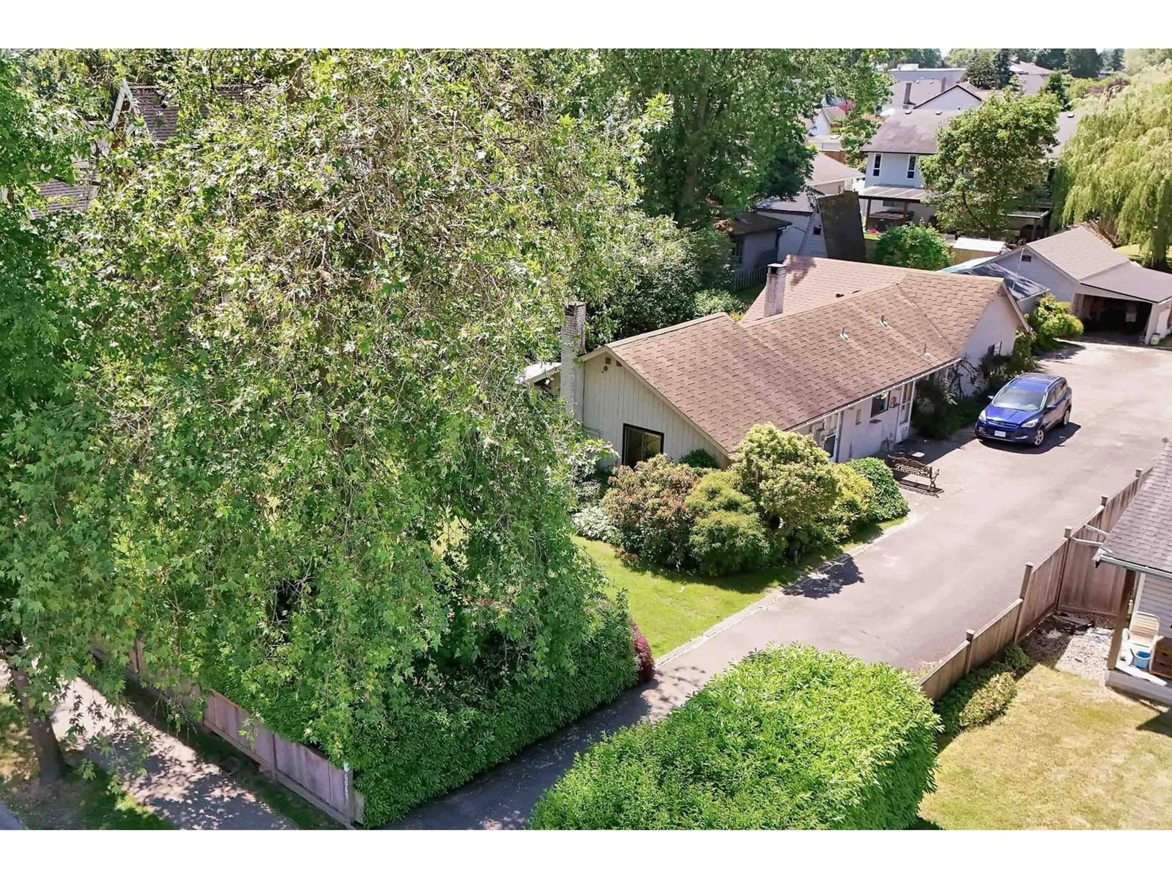 A pic from outside/outdoor area/front of a property/back of a property/a pic from drone, street for 6069 188, Surrey British Columbia V3S7V9
