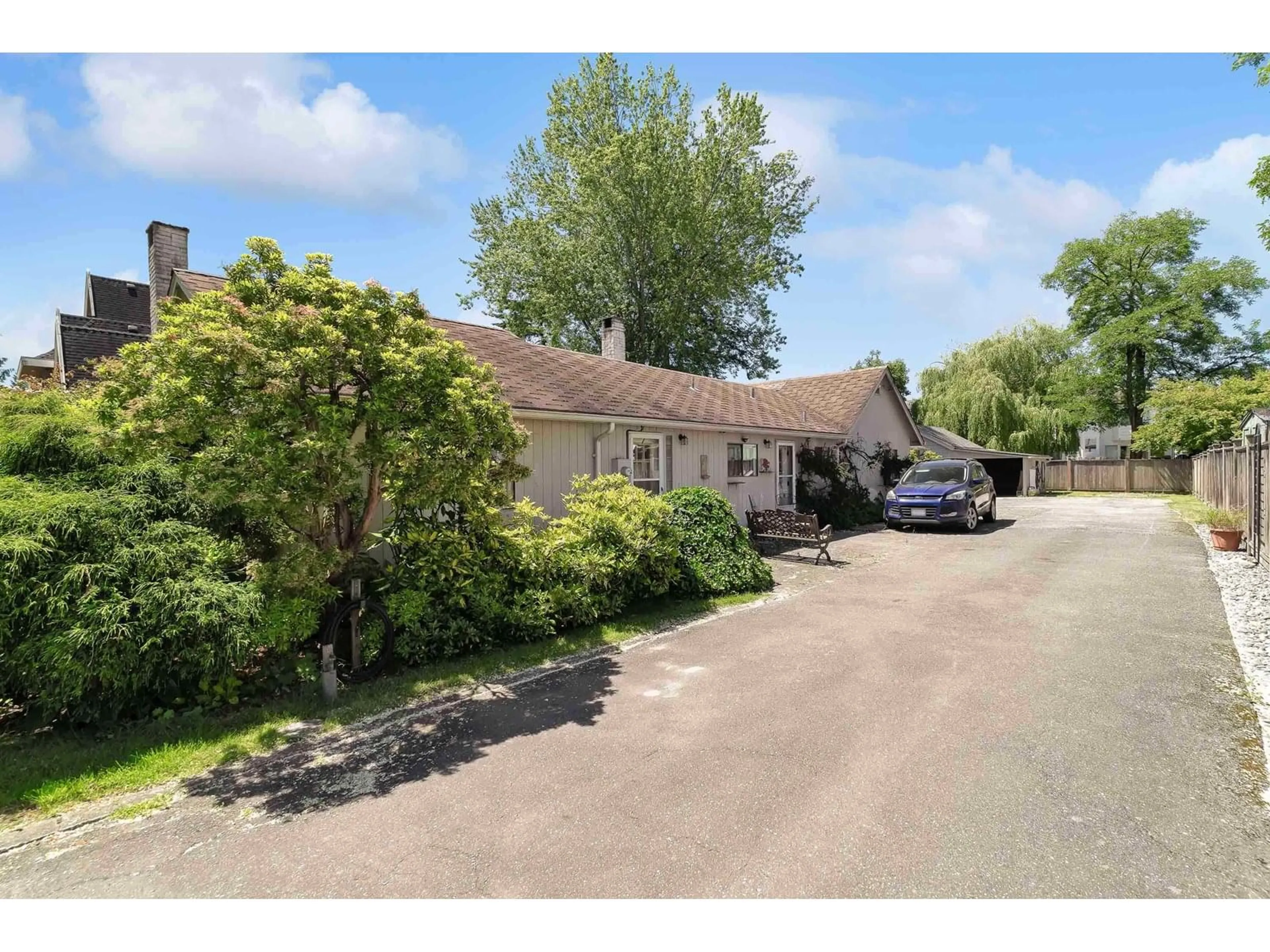 A pic from outside/outdoor area/front of a property/back of a property/a pic from drone, street for 6069 188, Surrey British Columbia V3S7V9