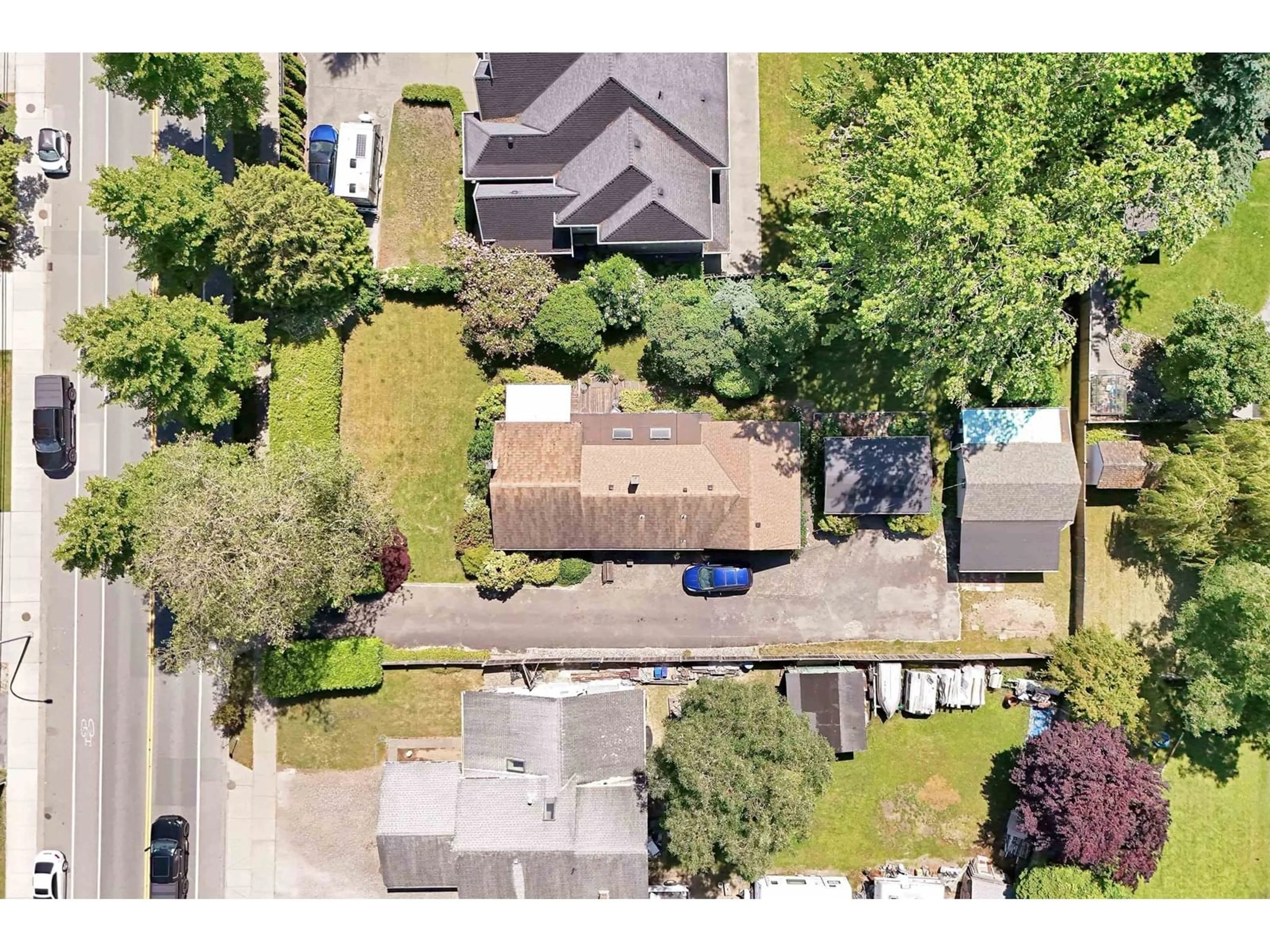 A pic from outside/outdoor area/front of a property/back of a property/a pic from drone, street for 6069 188, Surrey British Columbia V3S7V9