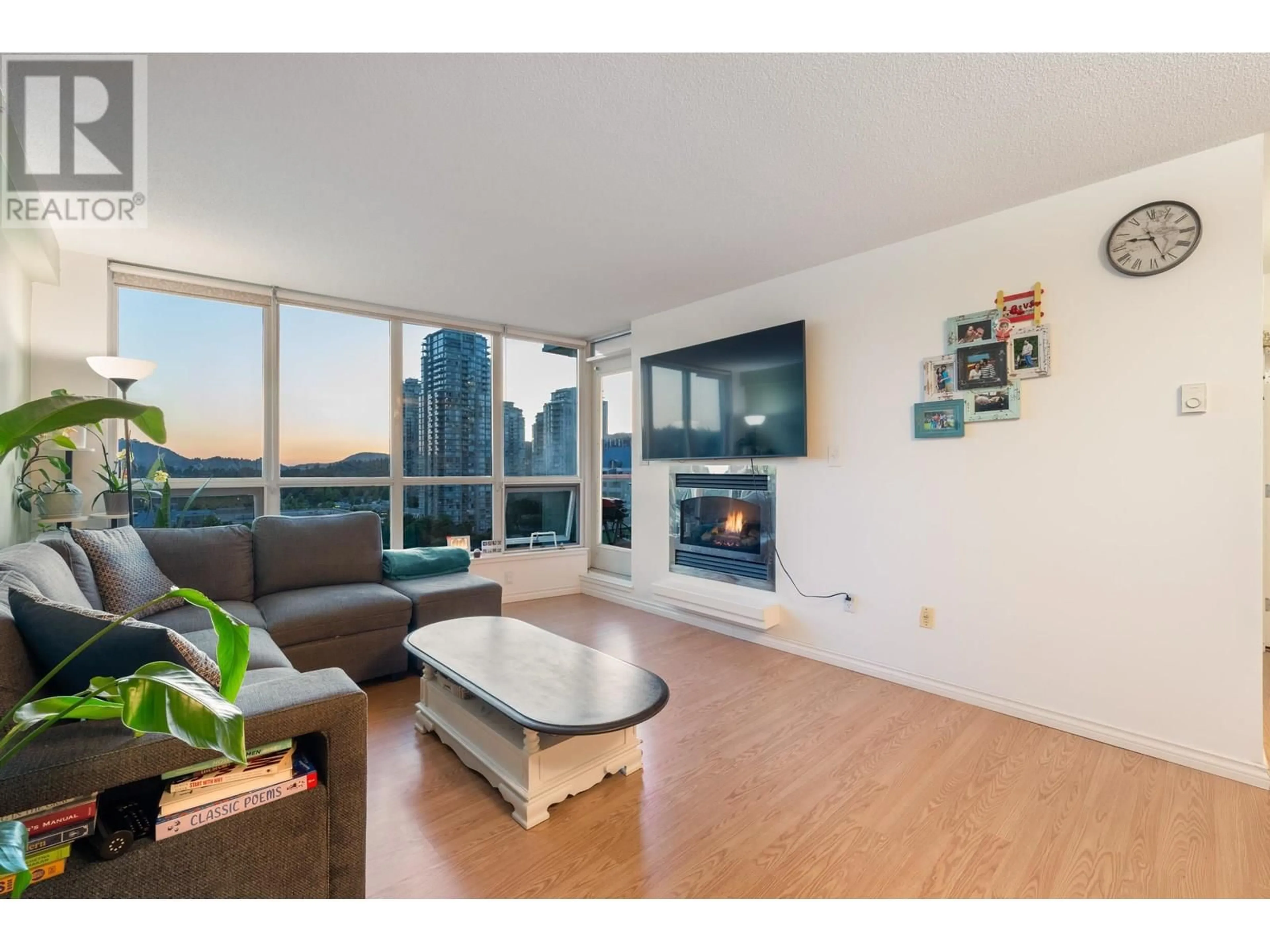 Living room with furniture, wood/laminate floor for 1506 - 1148 HEFFLEY CRESCENT, Coquitlam British Columbia V3B8A6