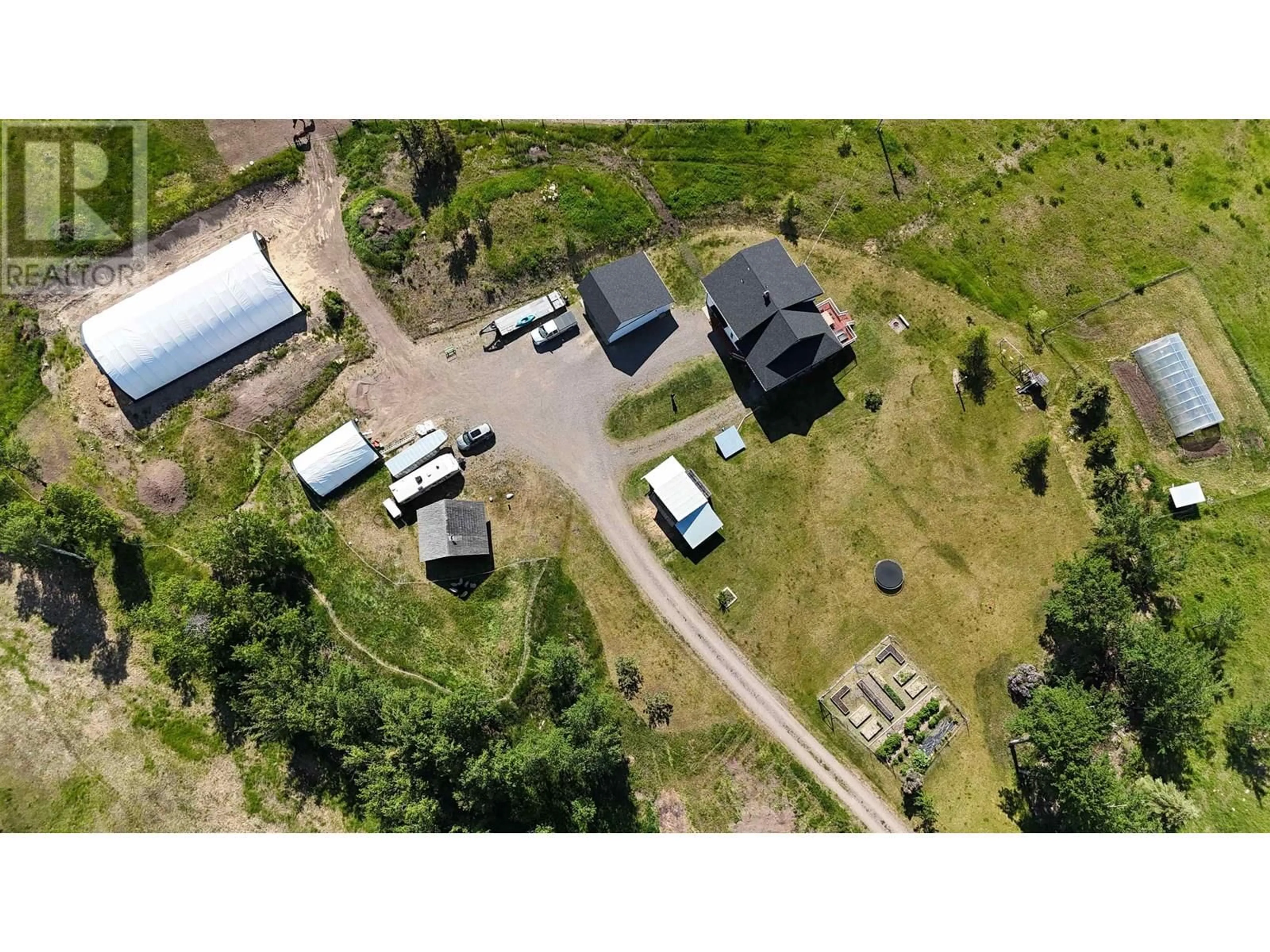 A pic from outside/outdoor area/front of a property/back of a property/a pic from drone, building for 14320 16 HIGHWAY, Telkwa British Columbia V0J2X1