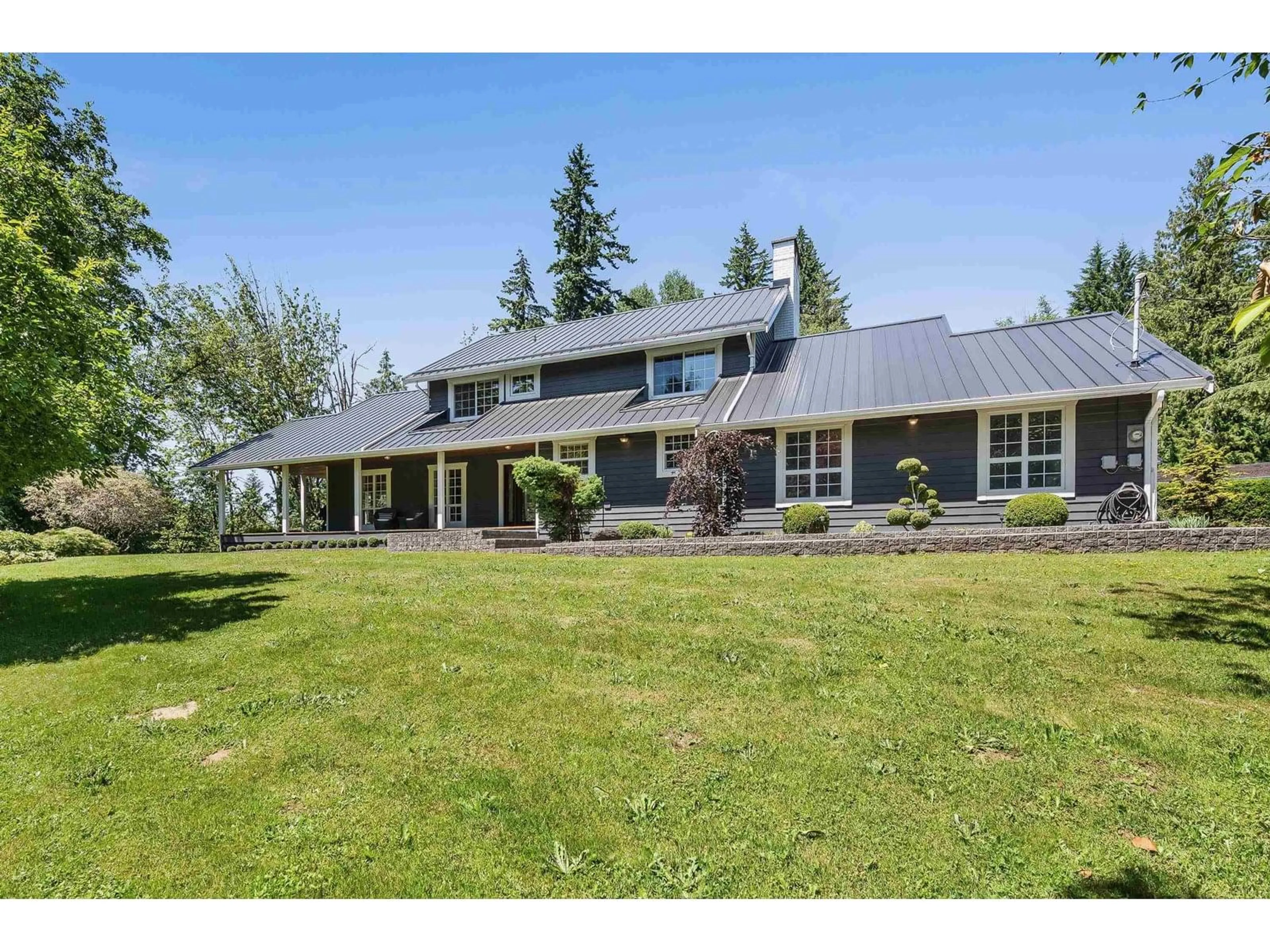 A pic from outside/outdoor area/front of a property/back of a property/a pic from drone, mountain view for 47315 EXTROM ROAD, Chilliwack British Columbia V2R4V1