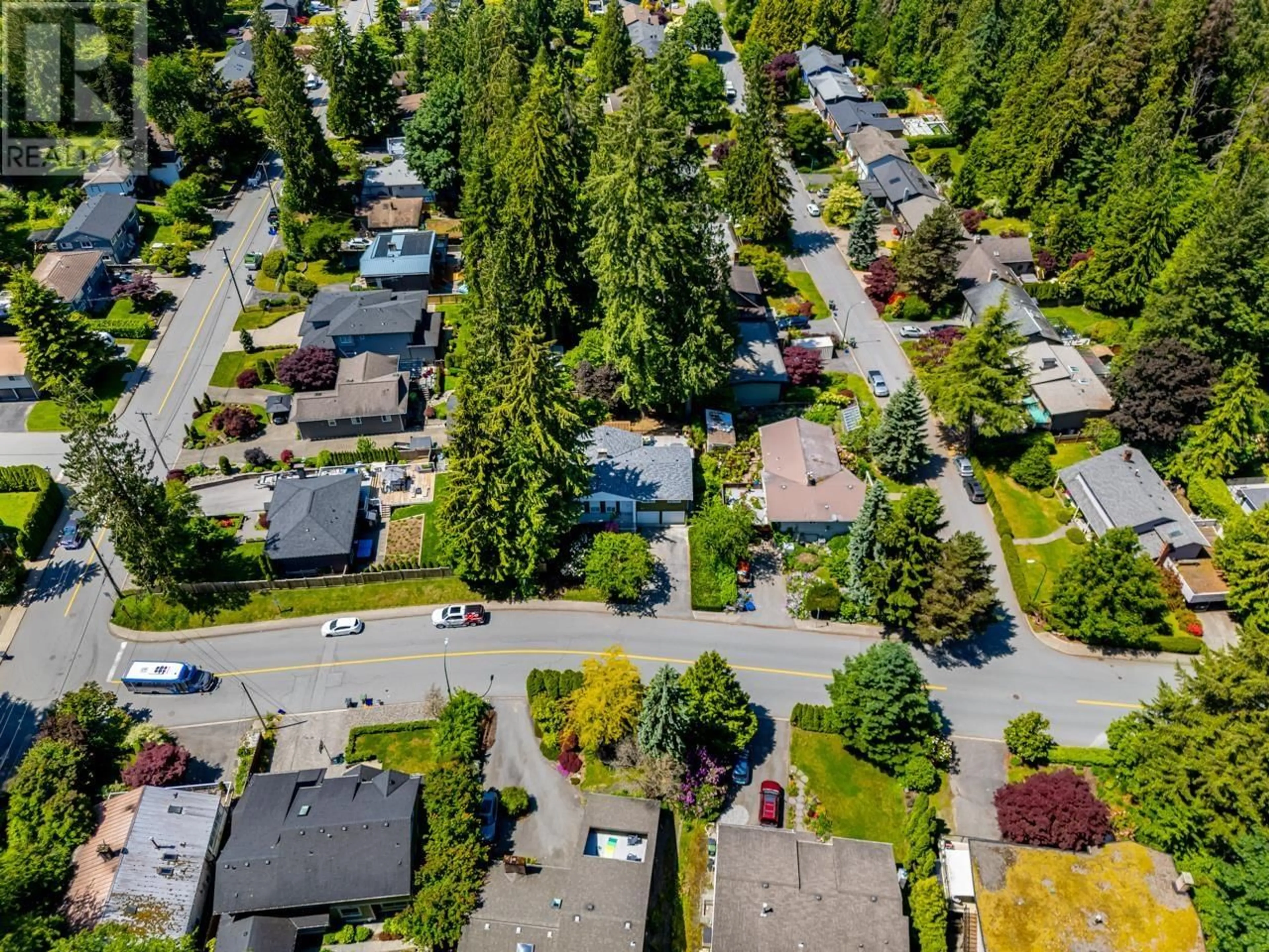 A pic from outside/outdoor area/front of a property/back of a property/a pic from drone, street for 3031 DUVAL ROAD, North Vancouver British Columbia V7J3J2