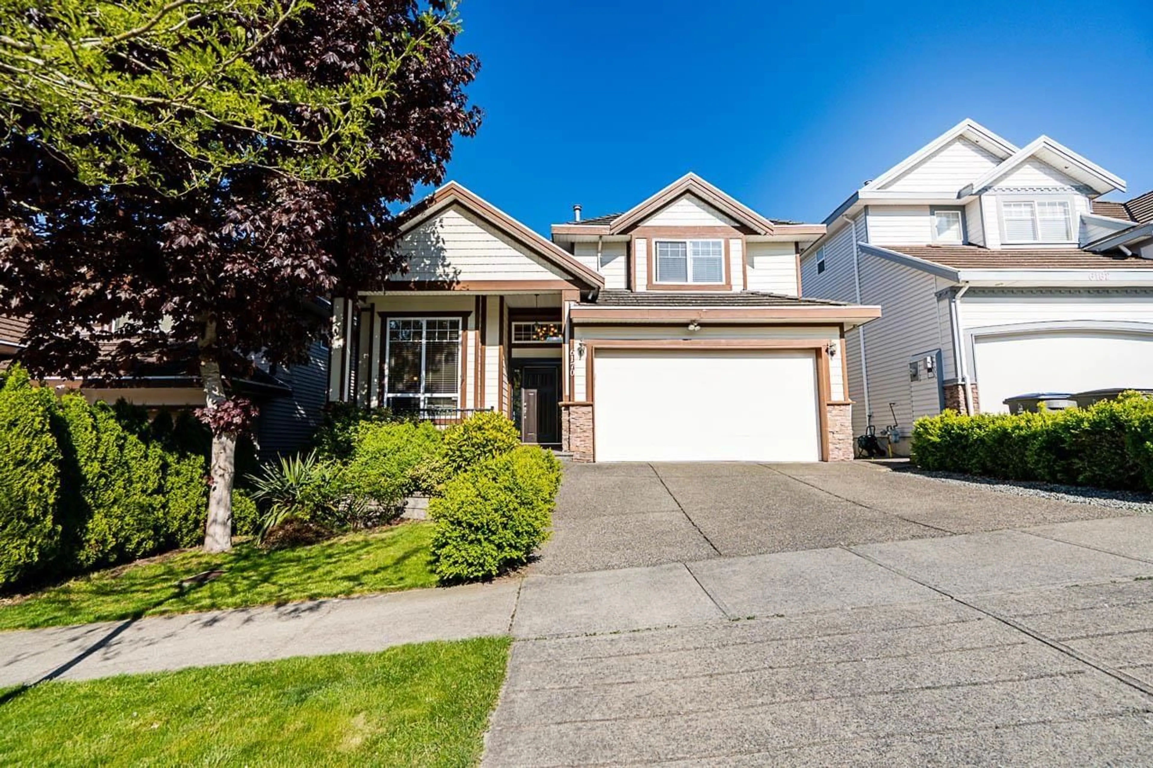 Home with vinyl exterior material, street for 6170 145A, Surrey British Columbia V3S8L1
