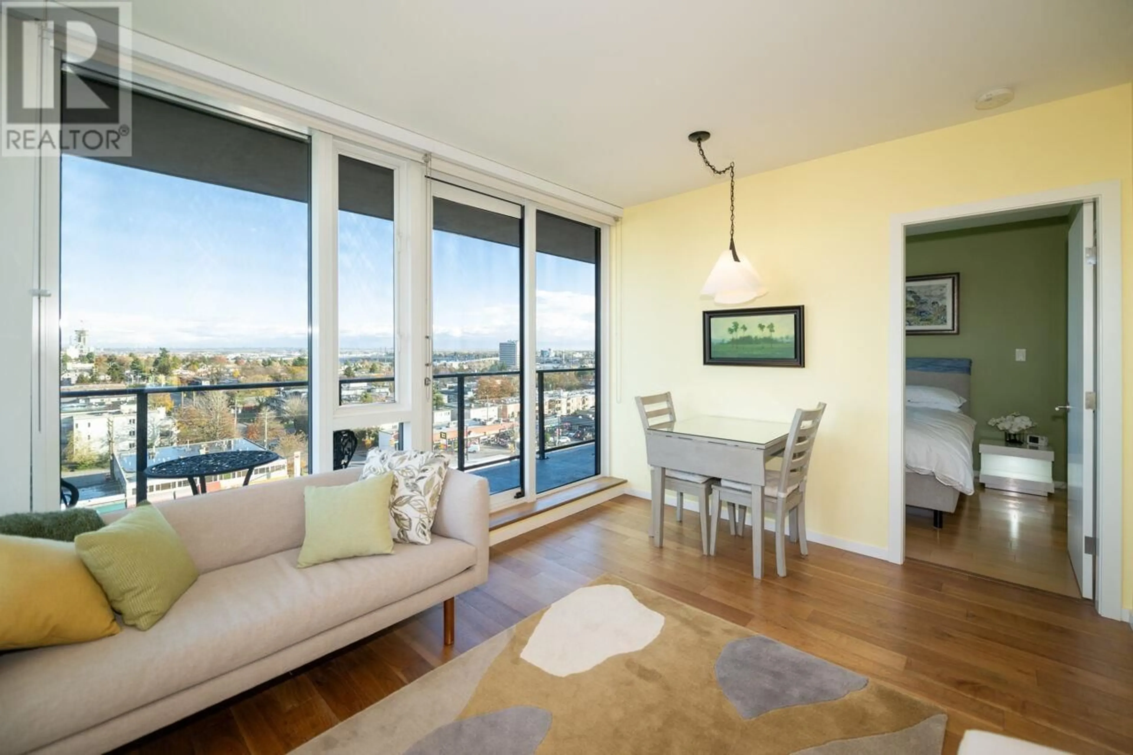 Living room with furniture, wood/laminate floor for 1105 - 8588 CORNISH STREET, Vancouver British Columbia V6P0C1
