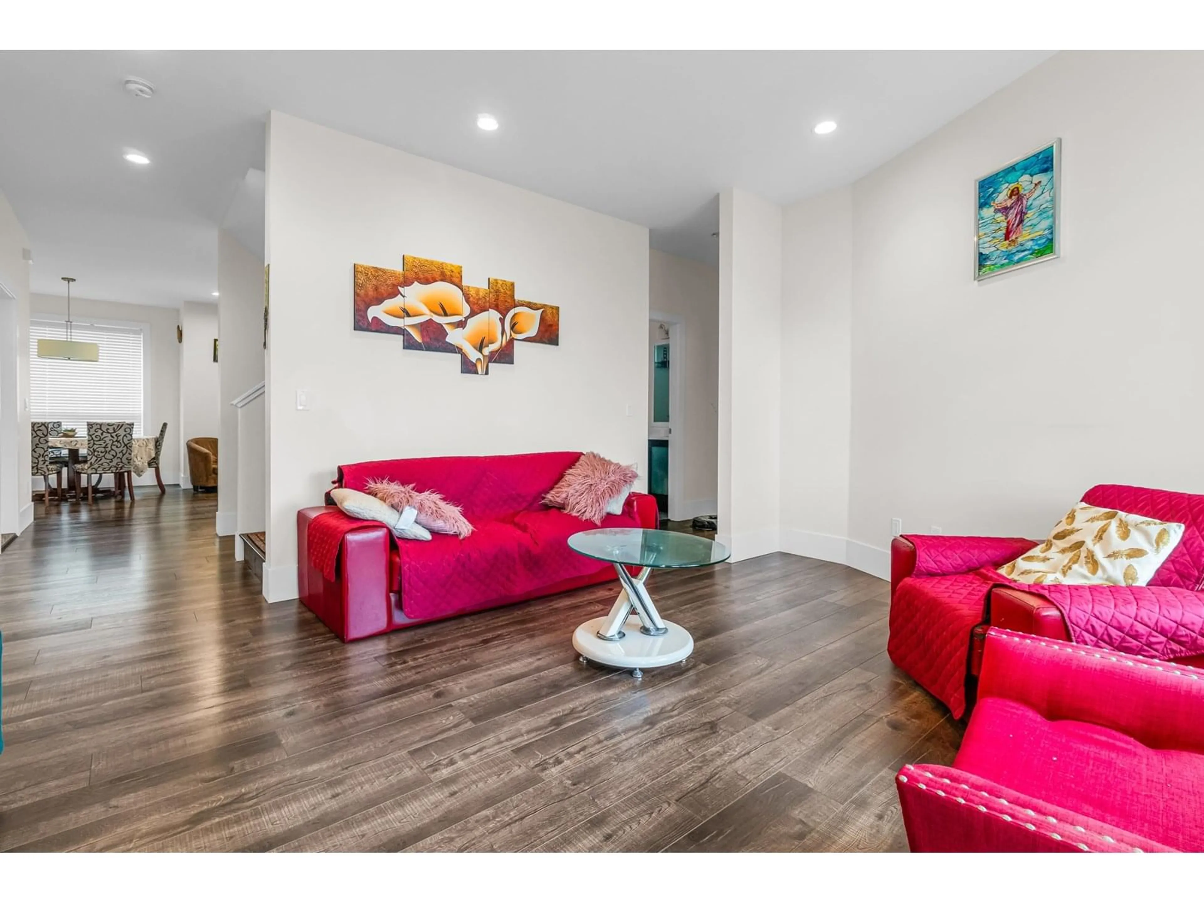 Living room with furniture, wood/laminate floor for 6121 147B, Surrey British Columbia V3S2L8