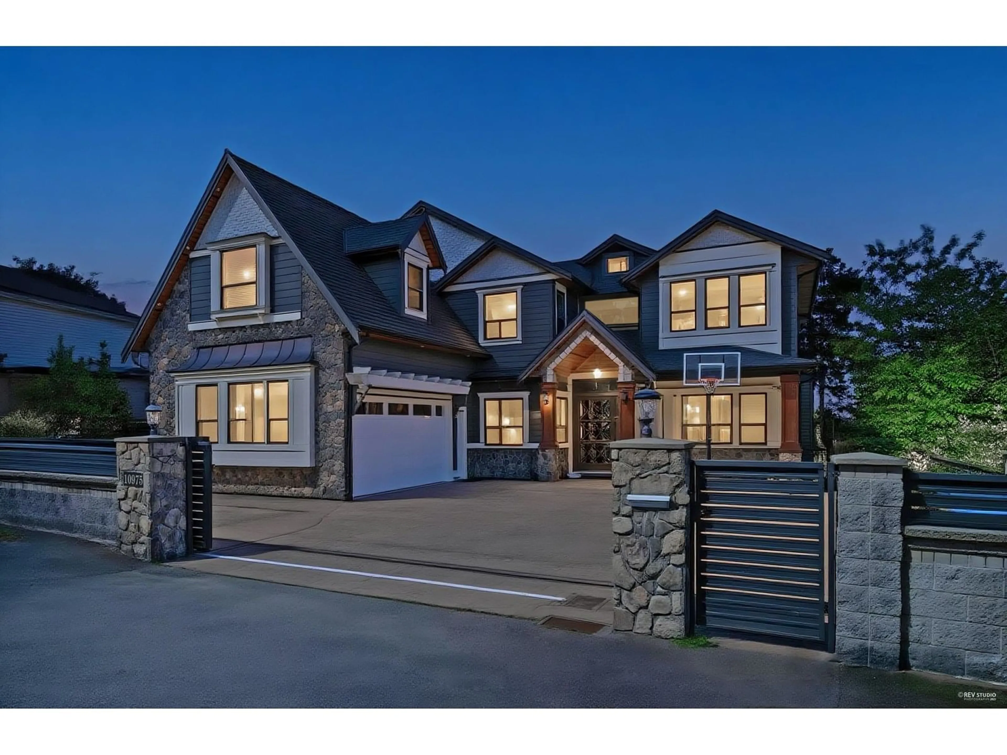 Home with brick exterior material, street for 10975 130, Surrey British Columbia V3T3M2
