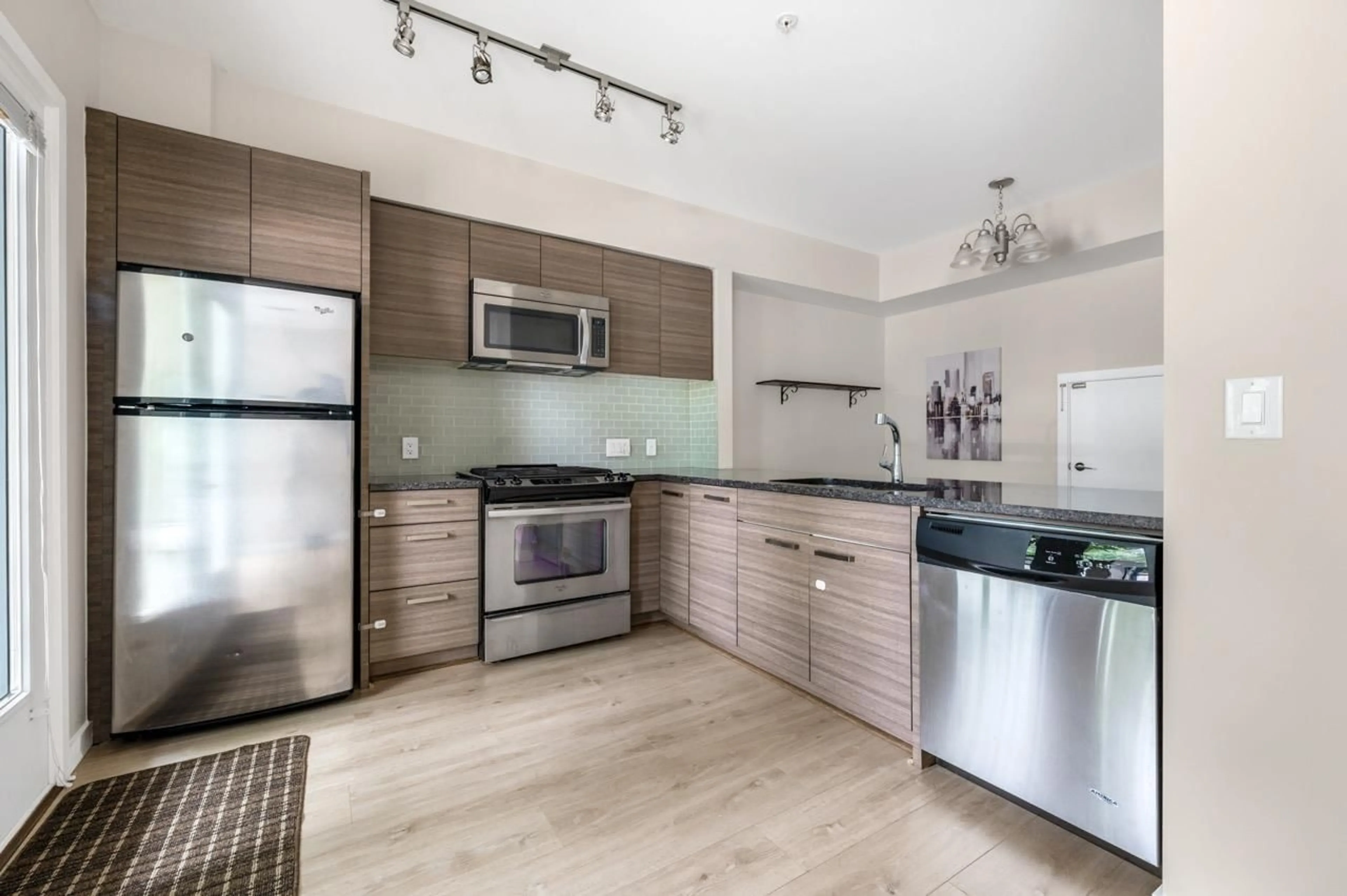 Open concept kitchen, unknown for 103 - 13228 OLD YALE, Surrey British Columbia V3T0K3