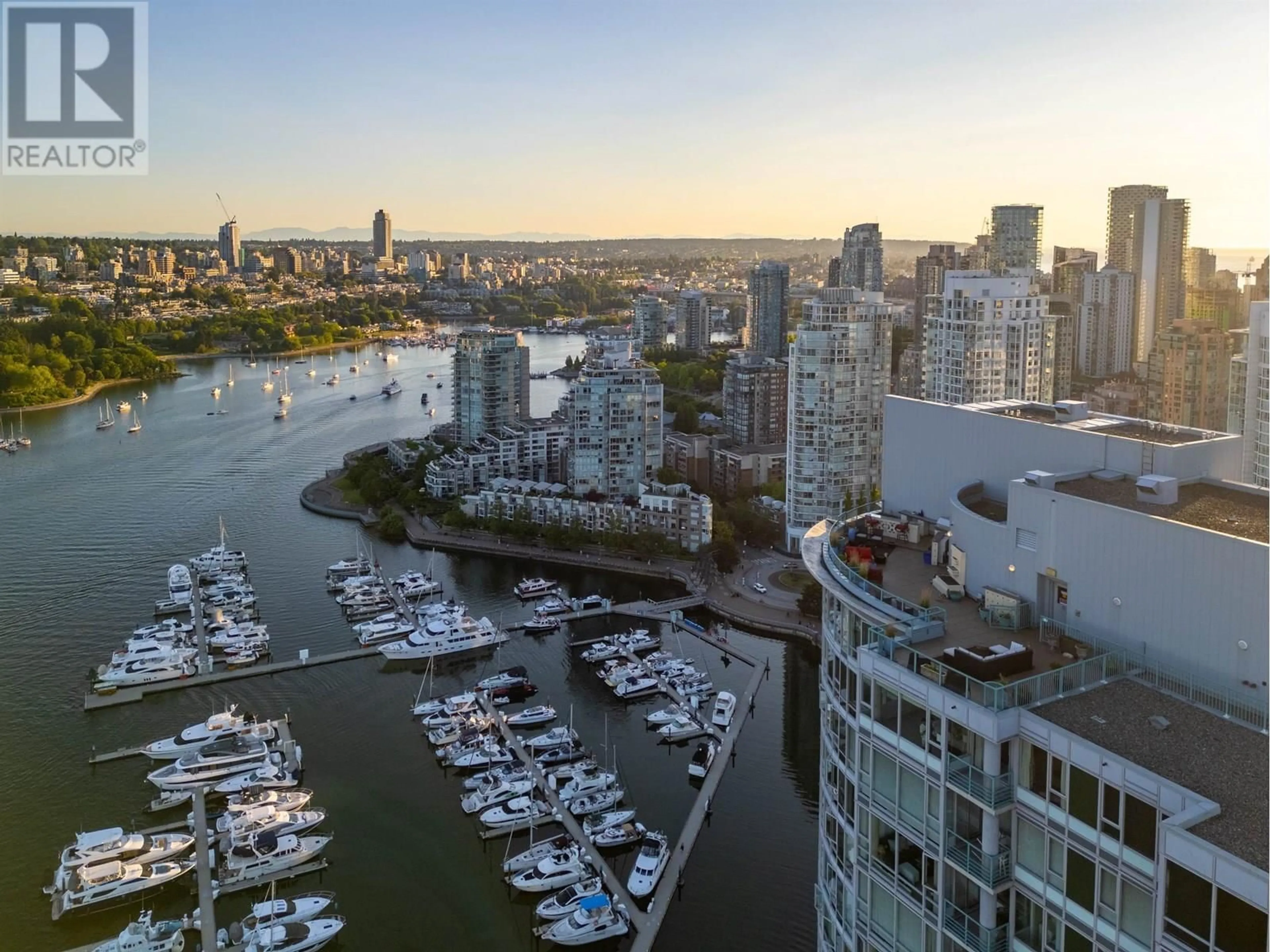 A pic from outside/outdoor area/front of a property/back of a property/a pic from drone, water/lake/river/ocean view for 3903 - 1033 MARINASIDE CRESCENT, Vancouver British Columbia V6Z3A3