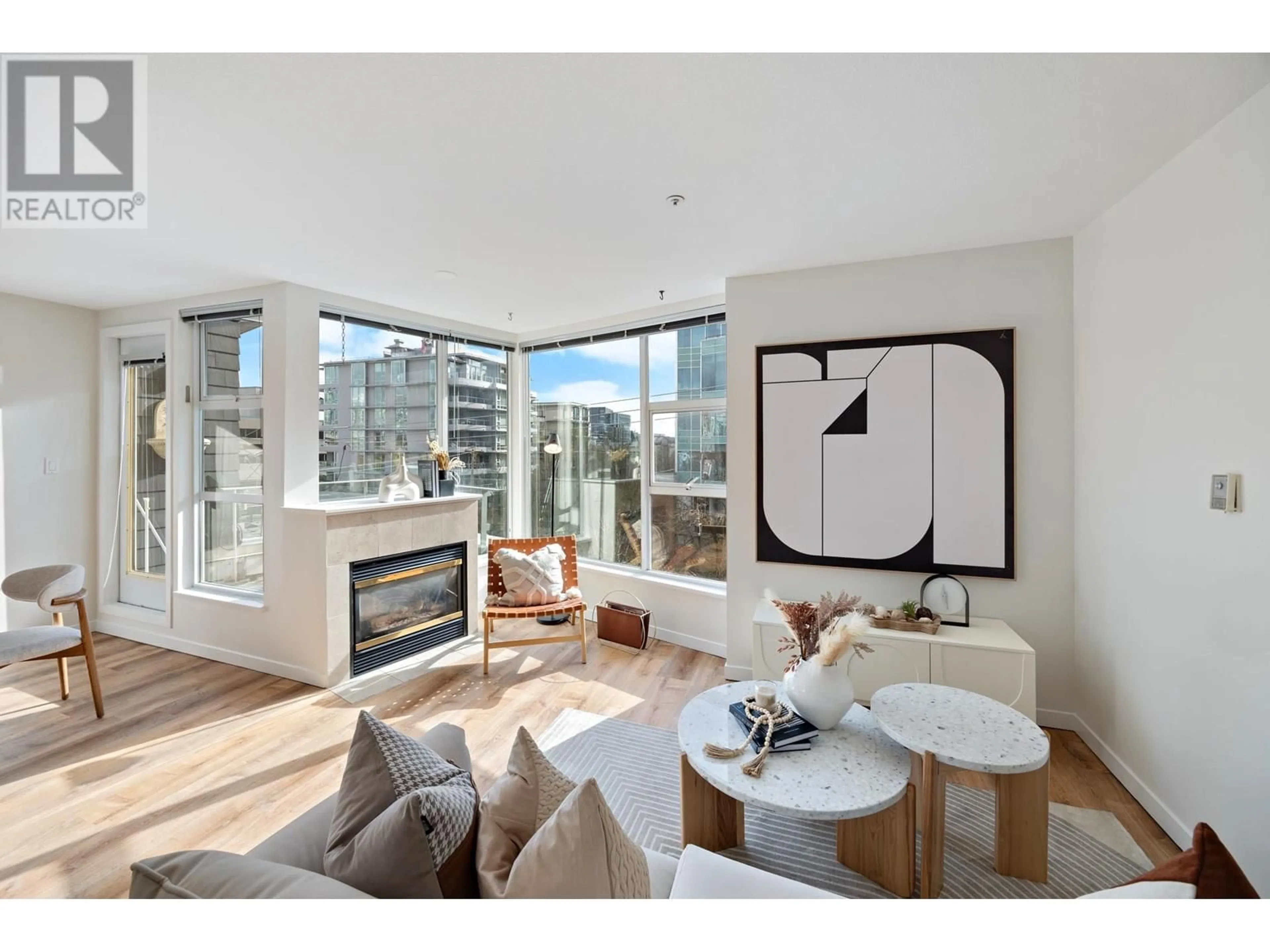 Living room with furniture, wood/laminate floor for 313 - 638 7TH AVENUE, Vancouver British Columbia V5Z1B5